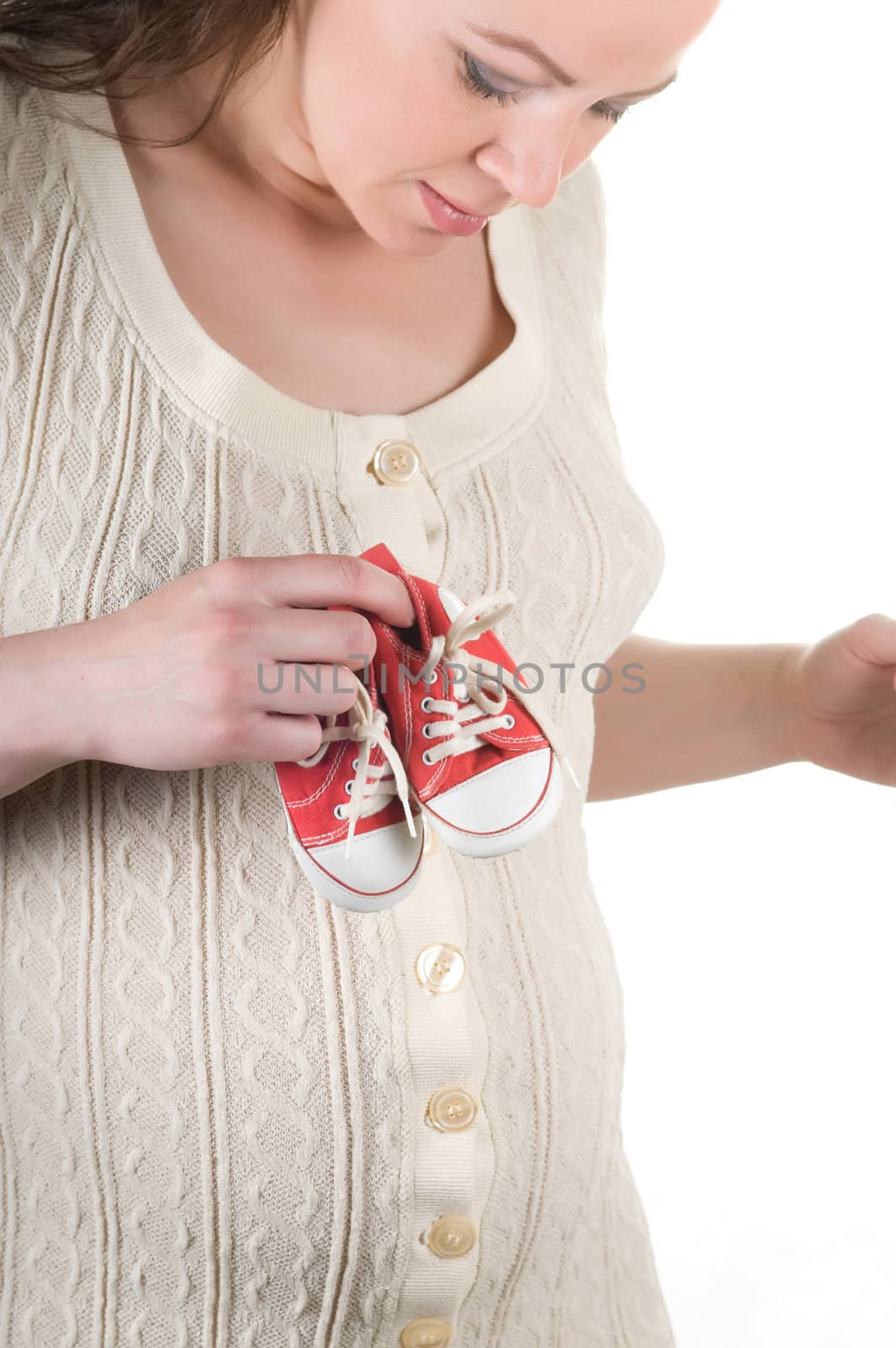 Shot of beautiful pregnant woman isolated on white