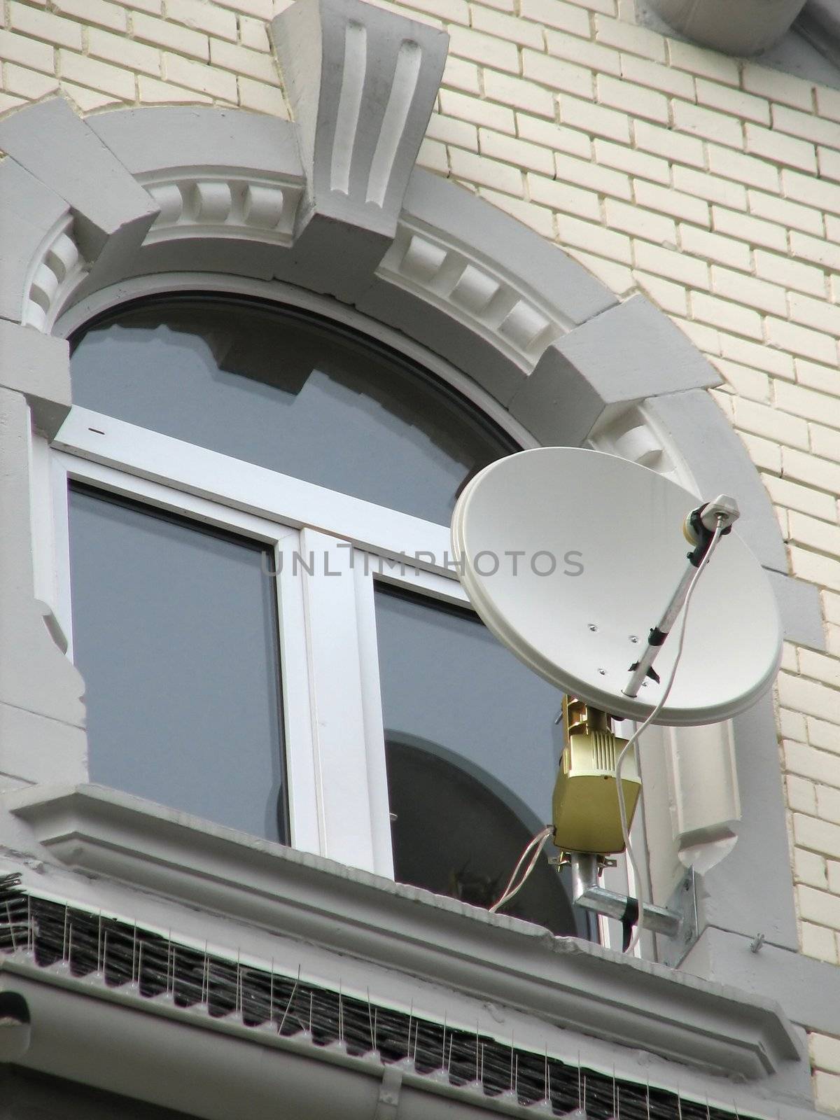 modern communication device on an old building