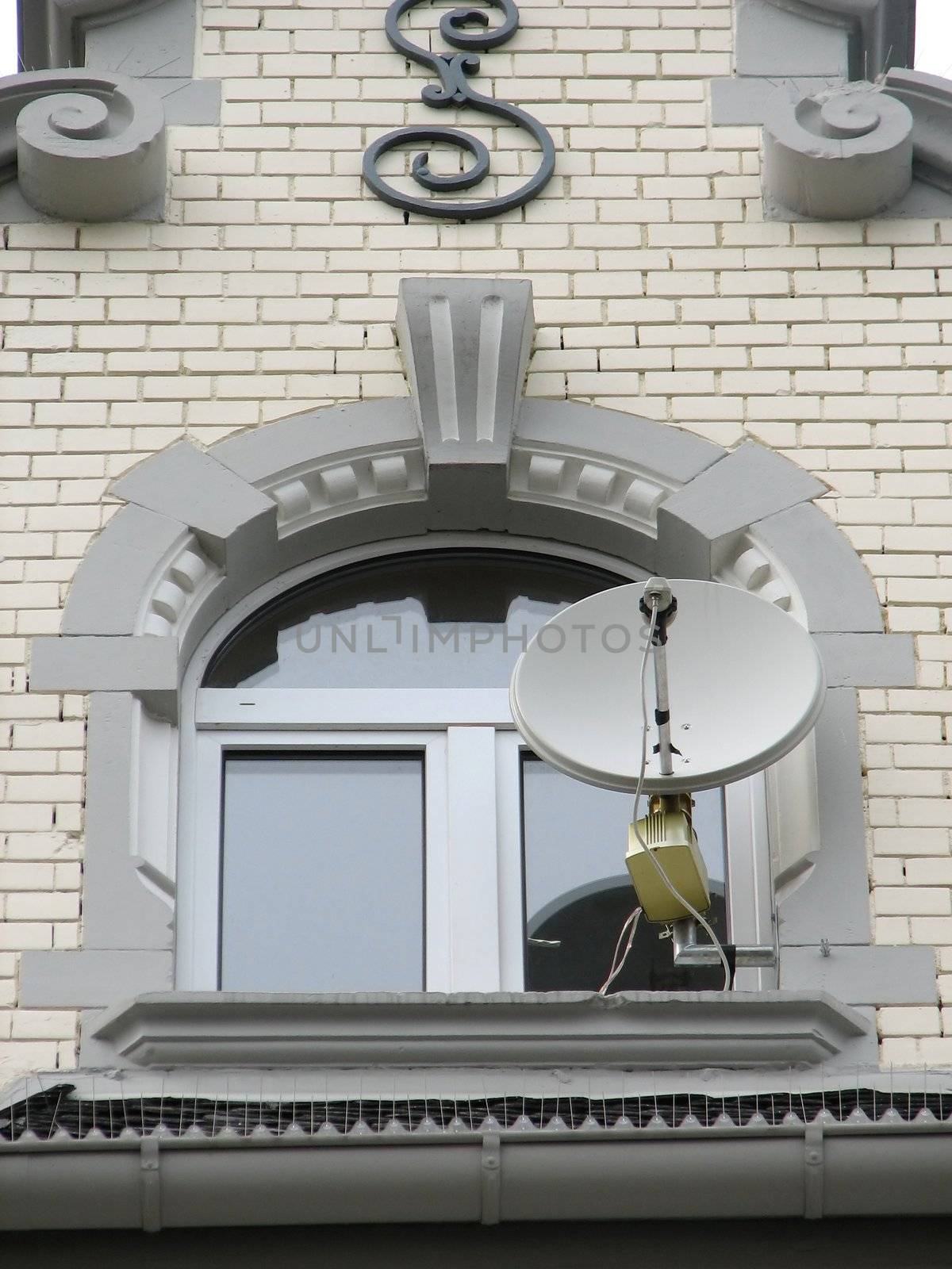 modern communication device on an old building