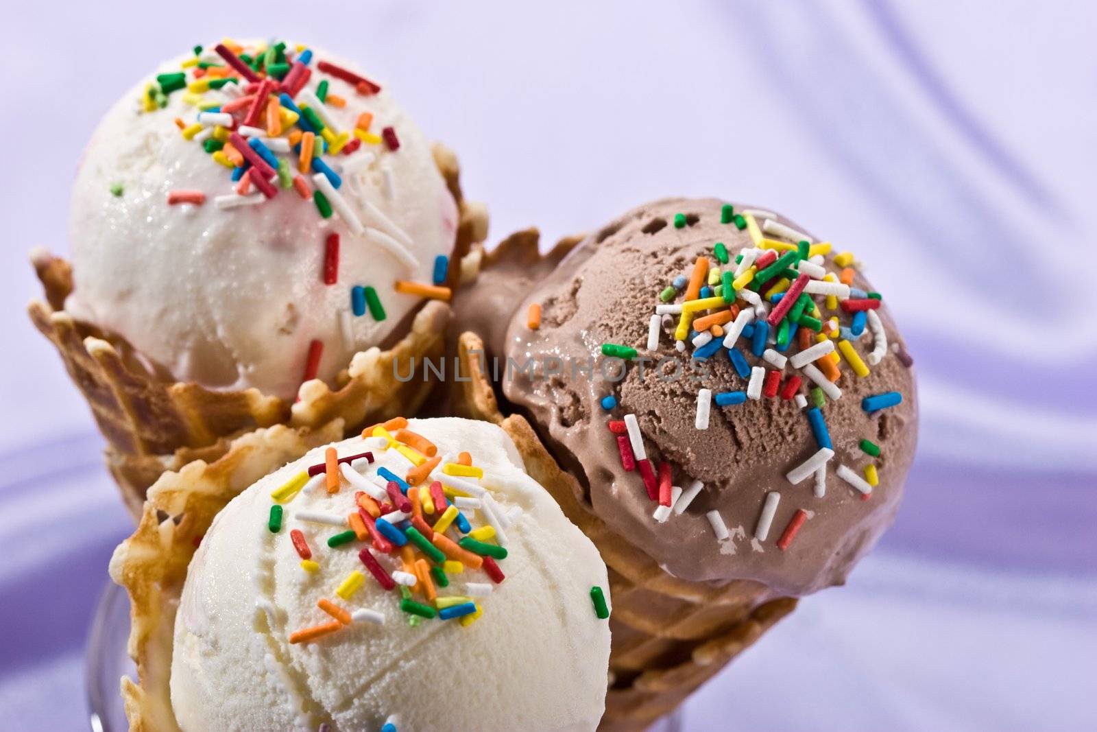 assorted ice cream in the horn with multicolored knick-knackery