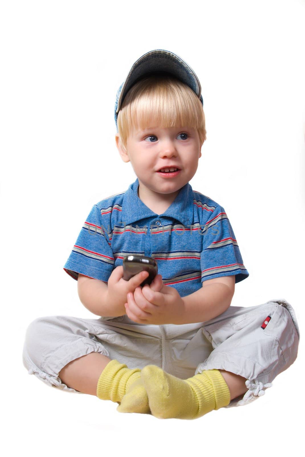 boy-blond keeps mobile telephone,small age