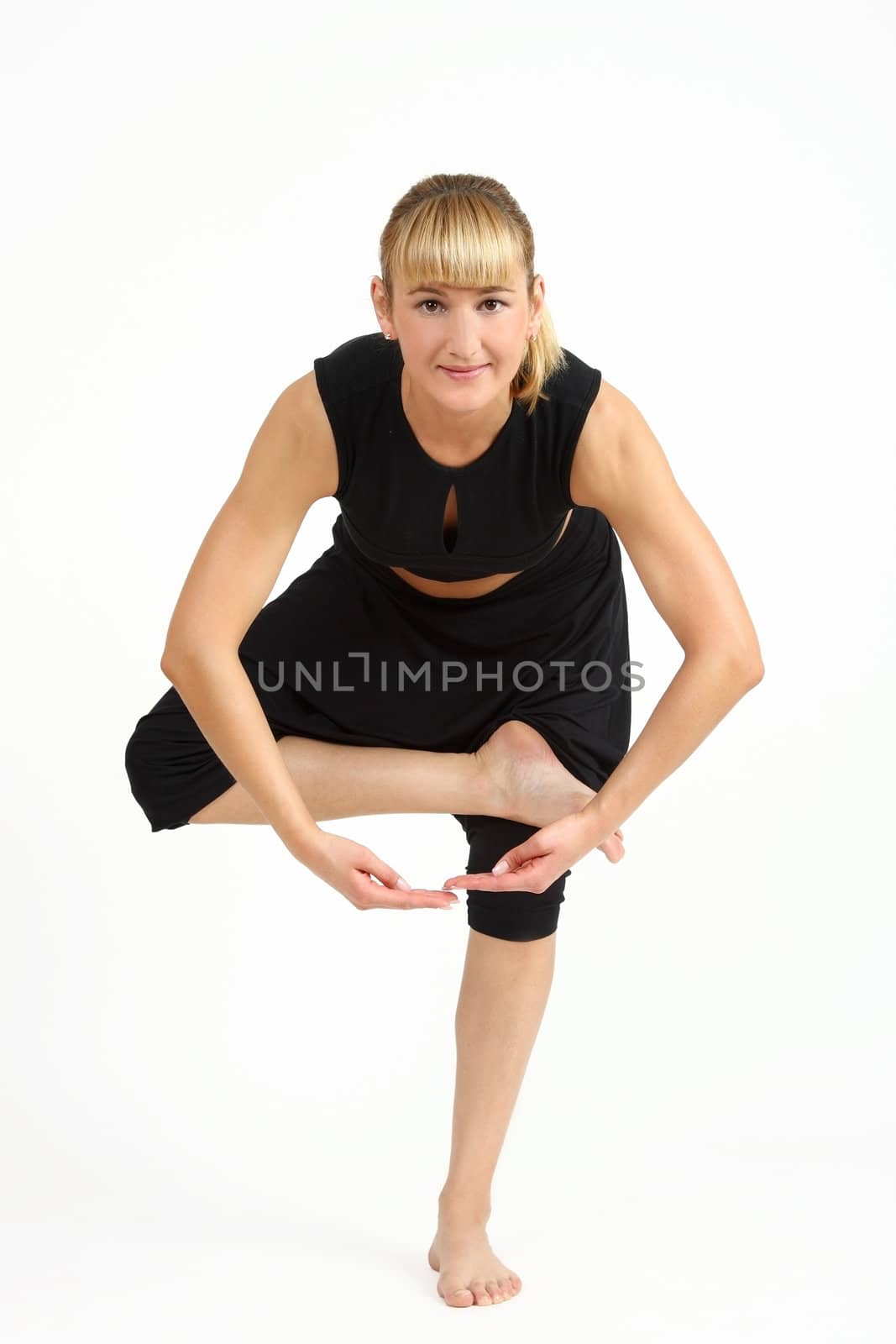 The girl, the instructor shows different exercises
