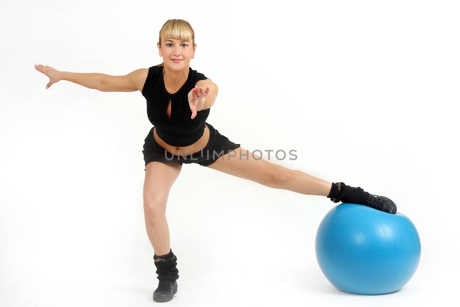 The girl, the instructor shows different exercises