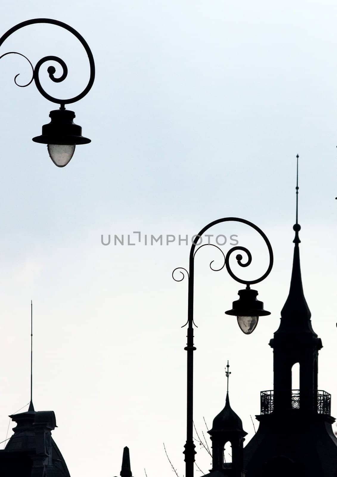 Romantic view of 2 lanterns and towers in Prague