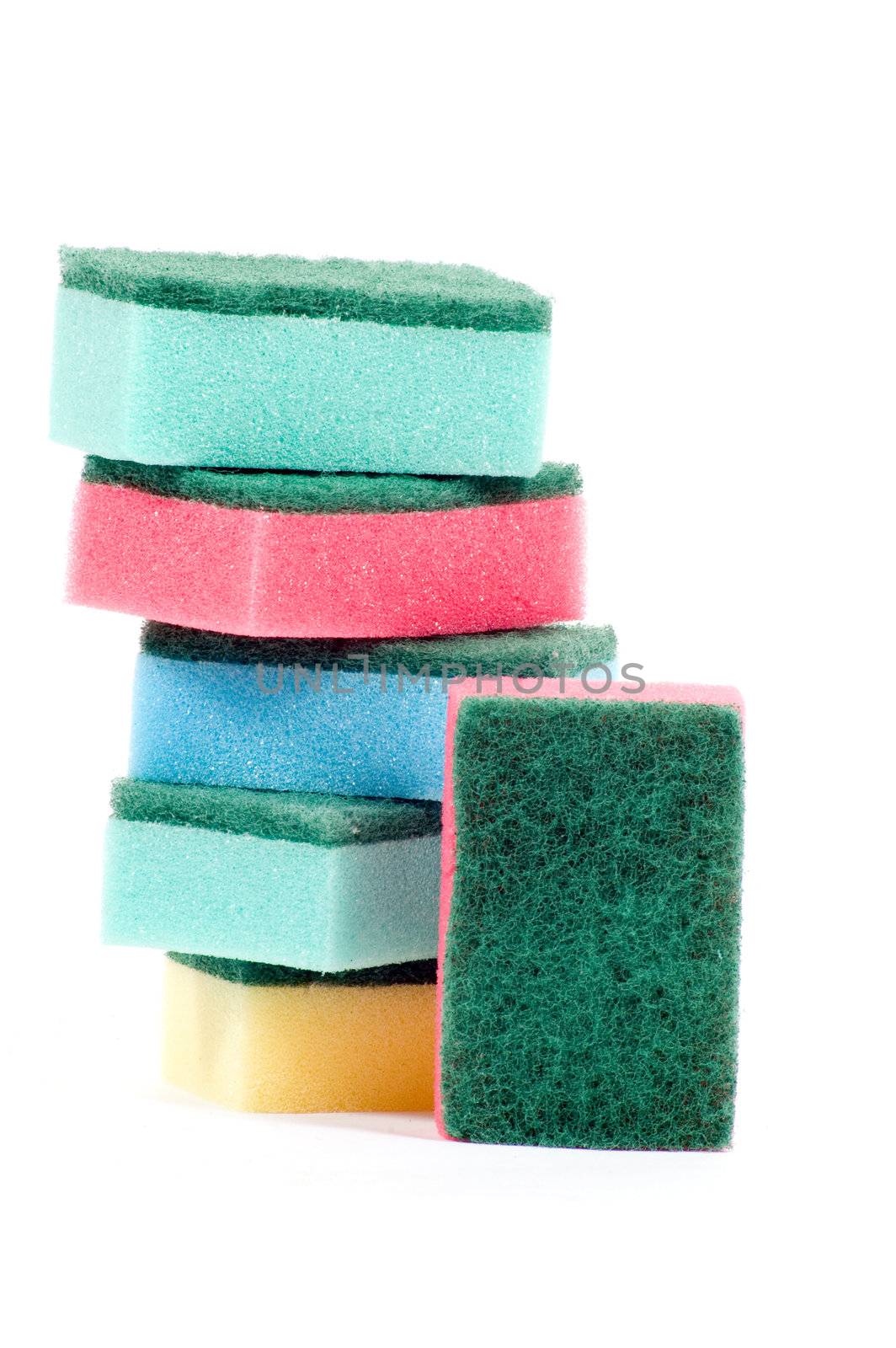 stack of colorful cleaning sponges by ladyminnie