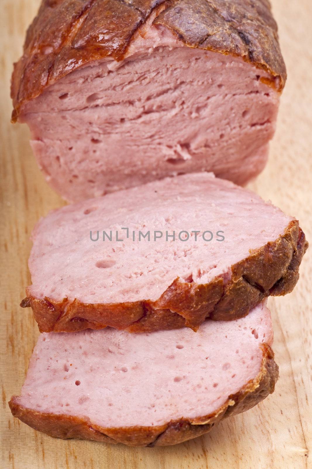 baked bavarian meat loaf on a wooden desk