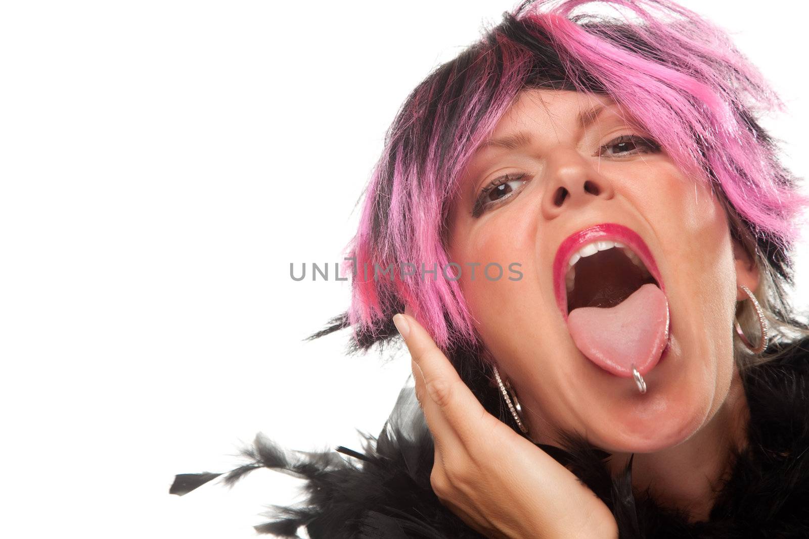 Pink And Black Haired Girl Sticking Her Pierced Tongue Out Isolated on a White Background.