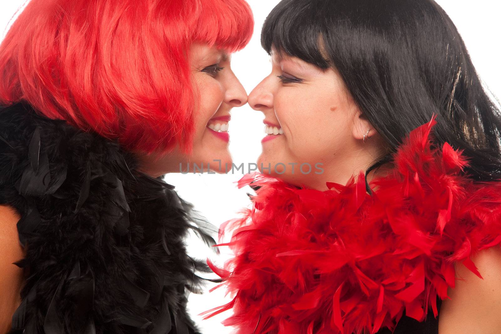 Red and Black Haired Women Smiling at Each Other by Feverpitched