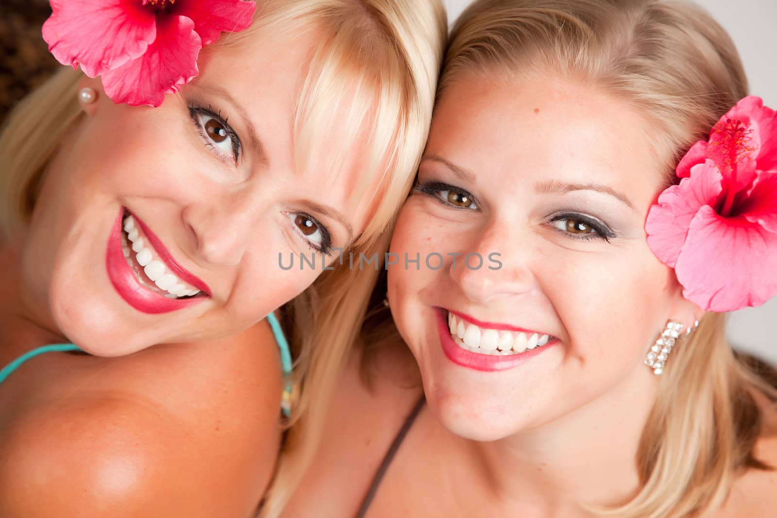 Beautiful Smiling Girls with Hibiscus Flowers by Feverpitched