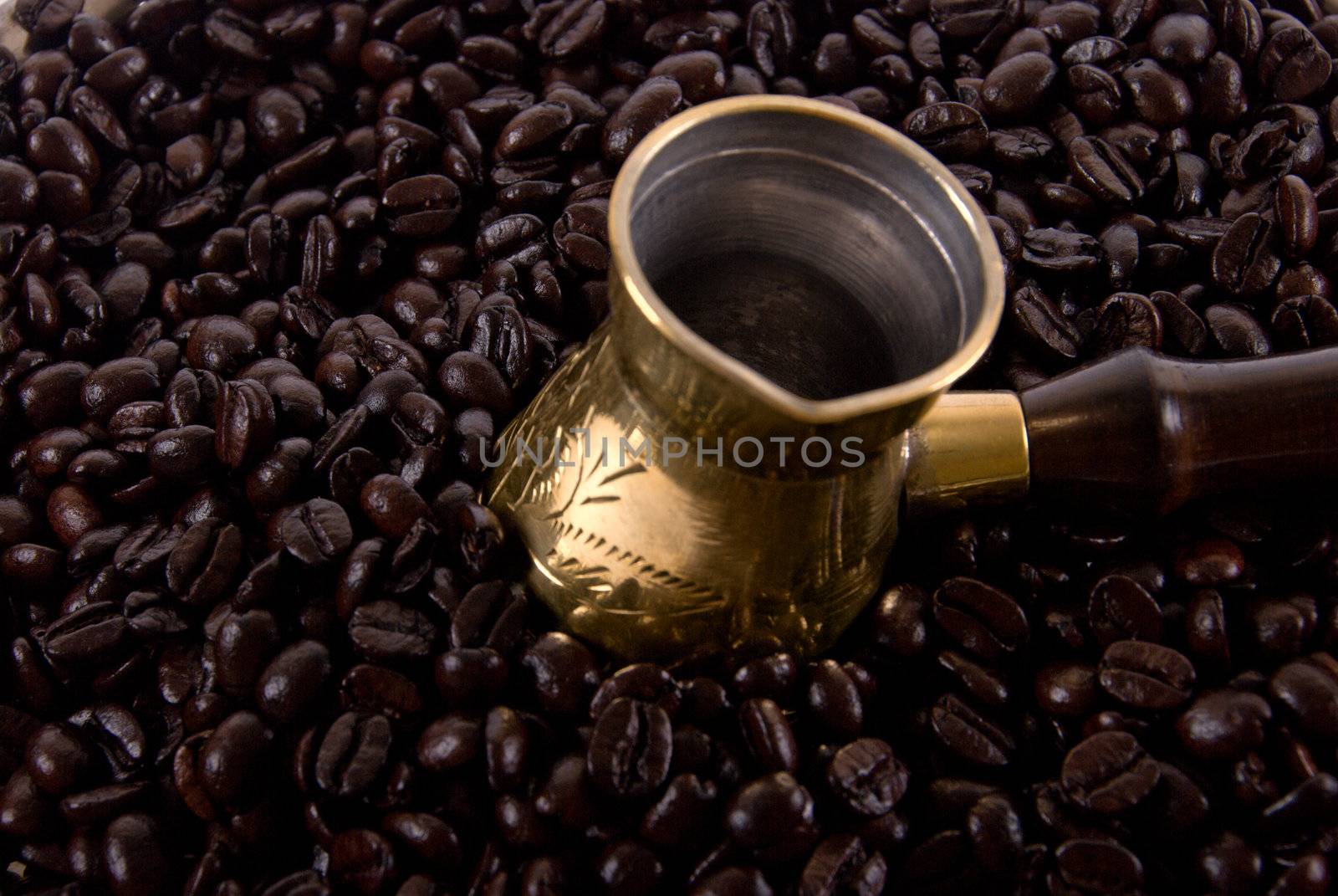 Arab coffee maker in the coffee beans by KRoman