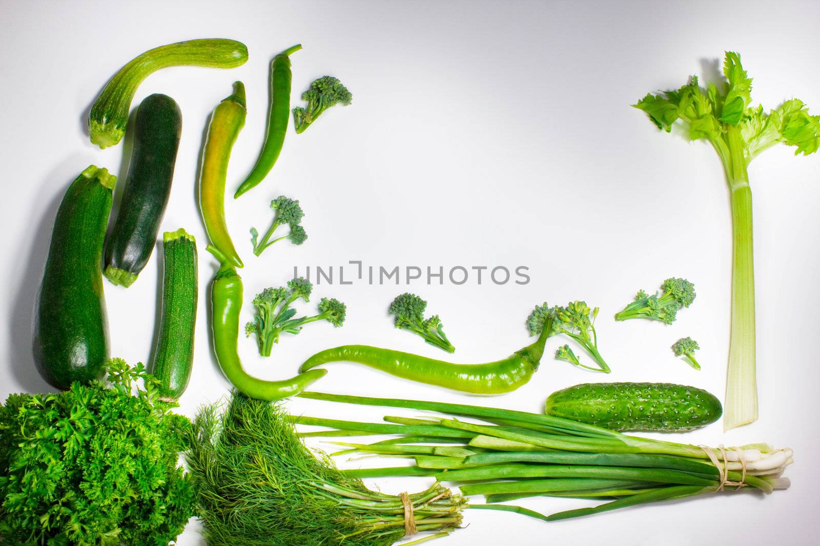 Fresh green vegetables isolated on white