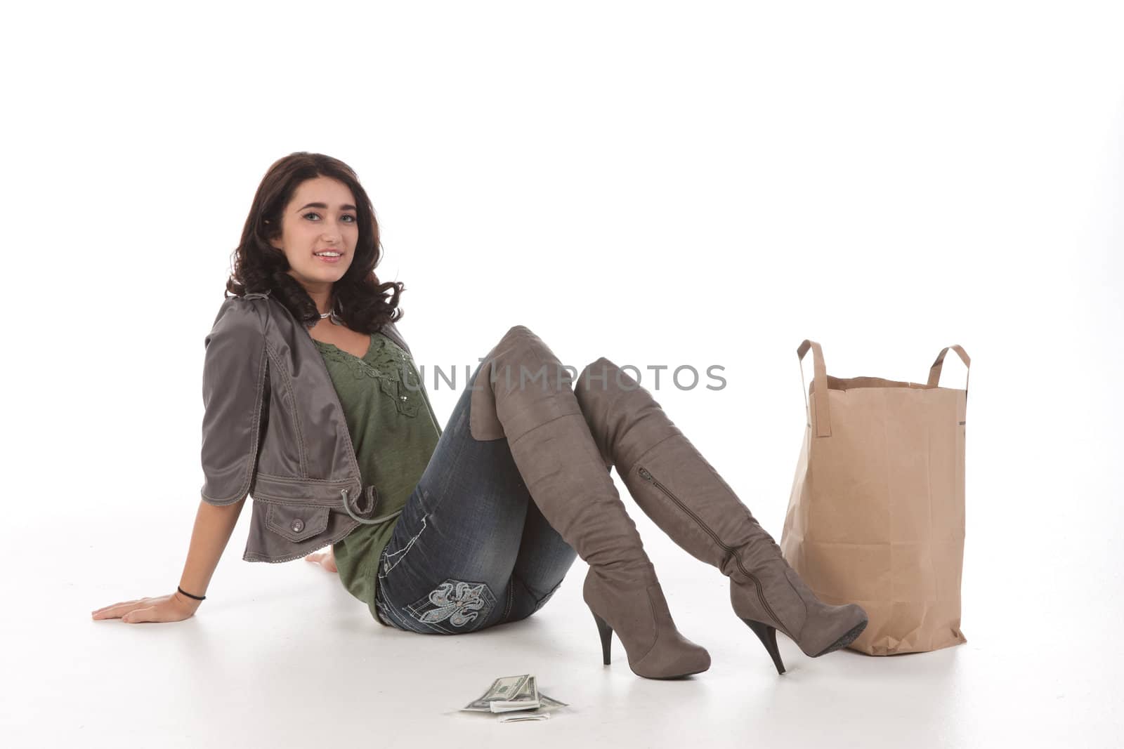 young woman with shopping and cash by clearviewstock