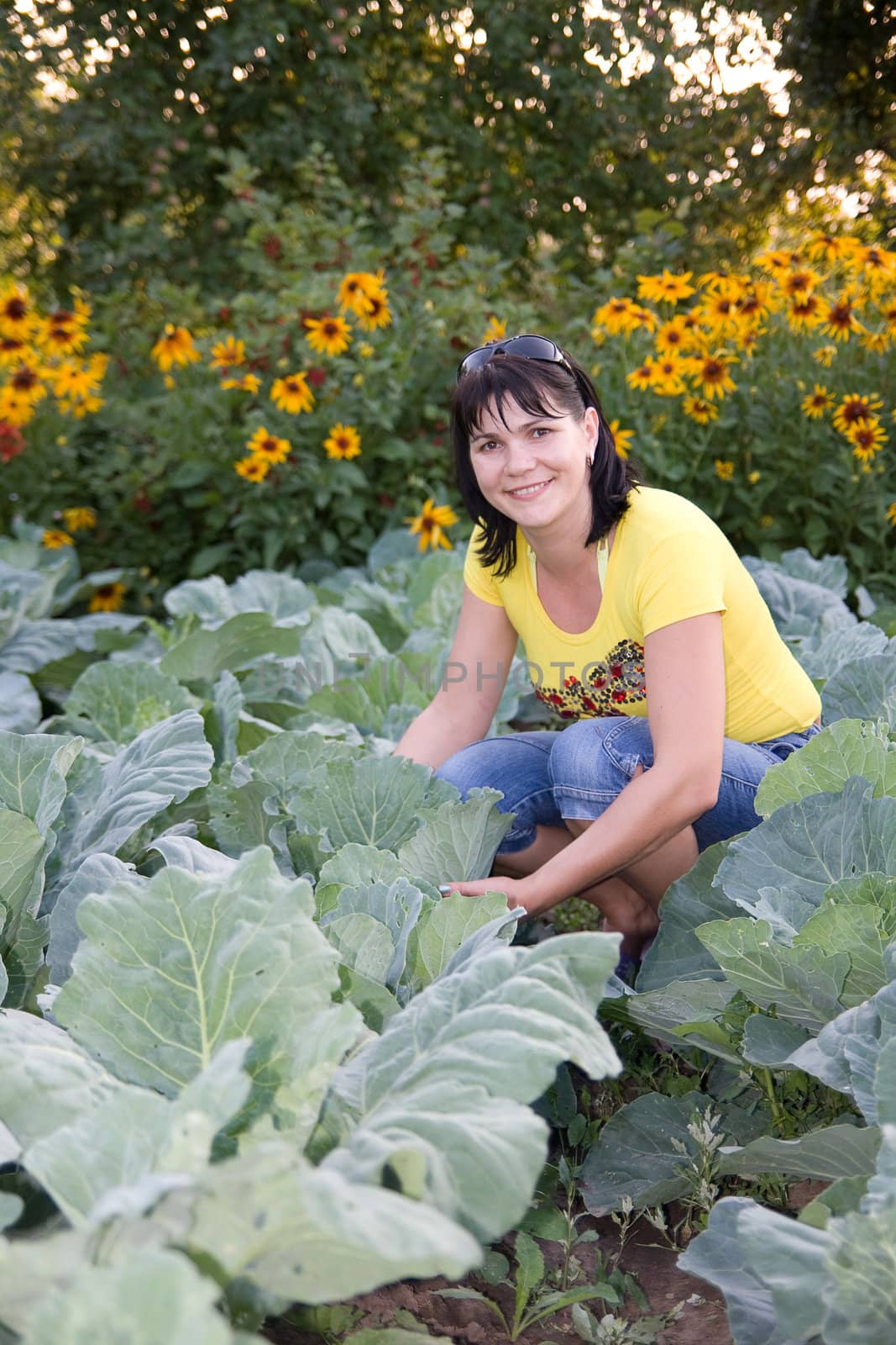Young woman in vegetable garden