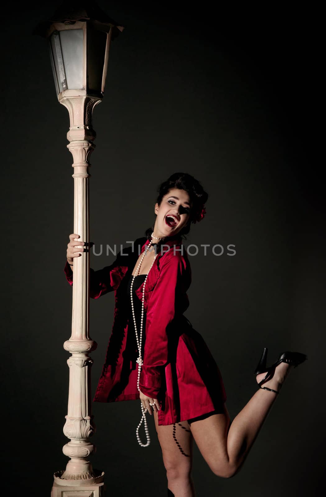 young woman and lightpole by clearviewstock