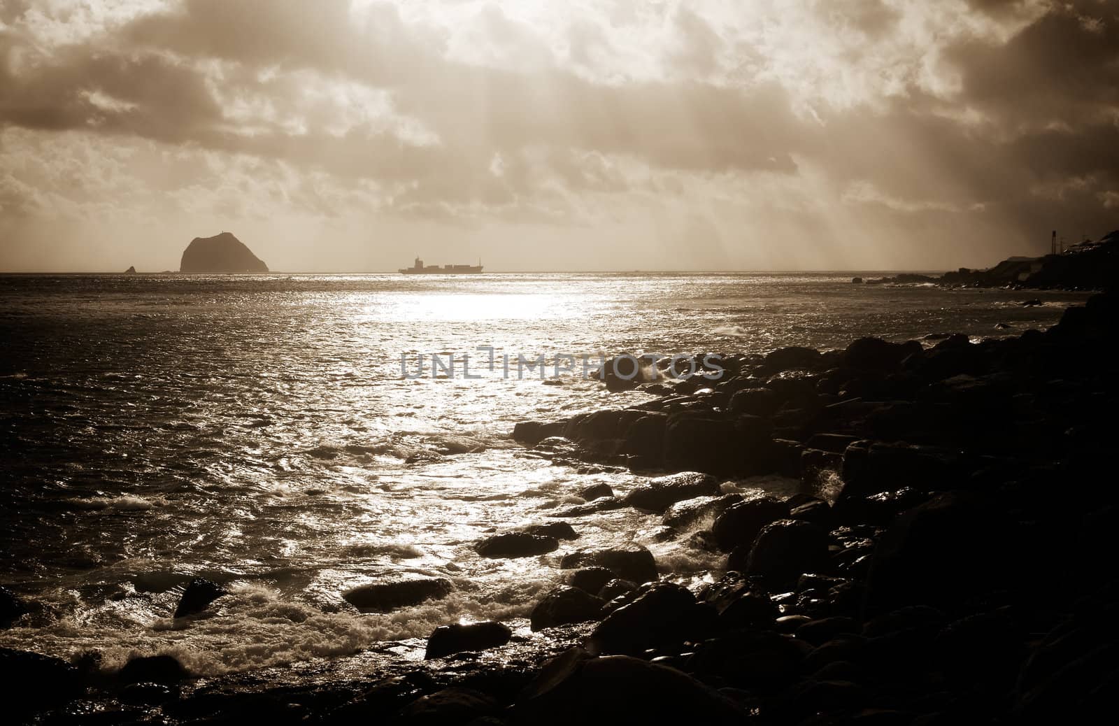 Here is a boat on the sea with strong light effect.