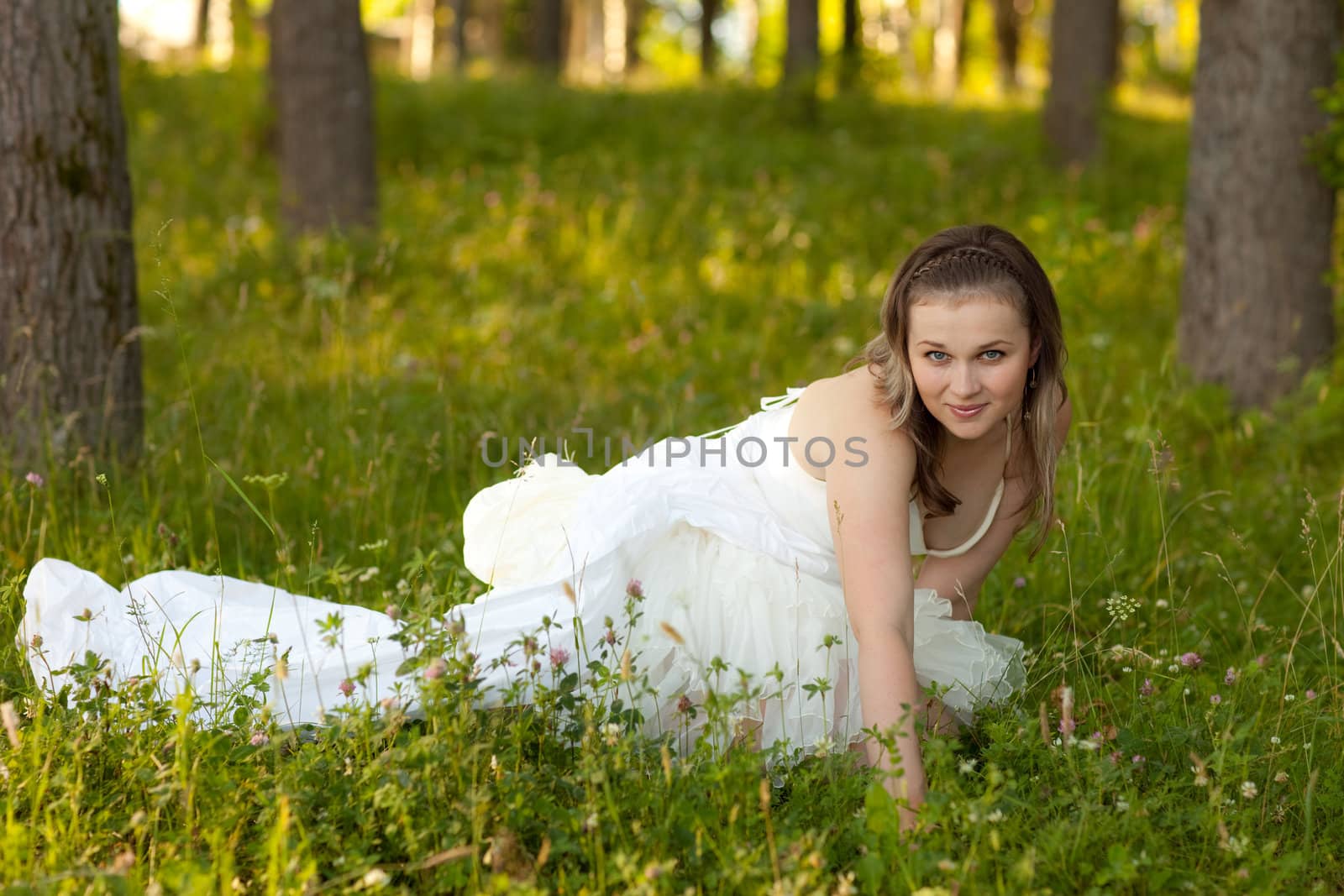 bride in white dress on the nature