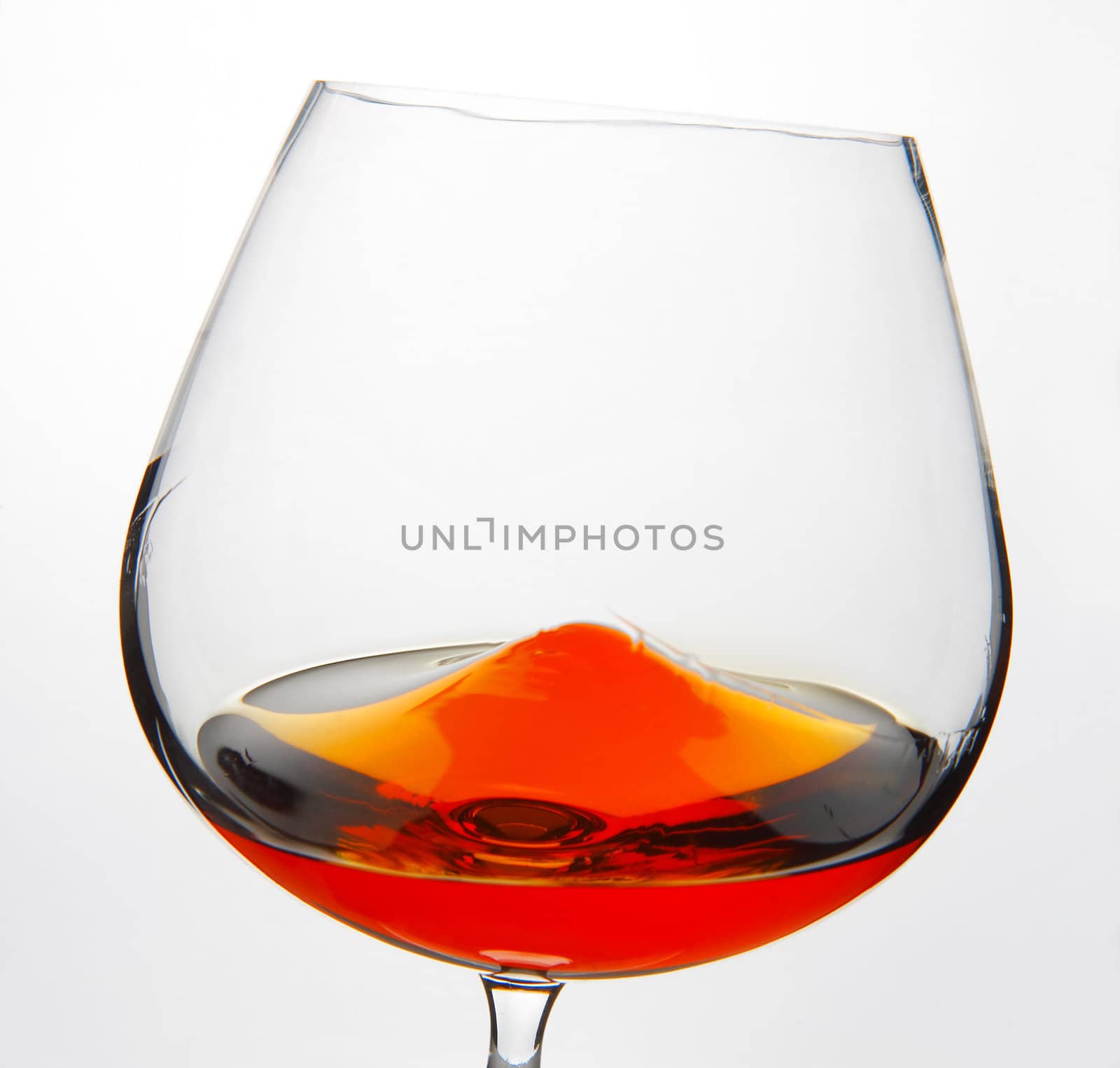 Glass of Cognac by romanshyshak