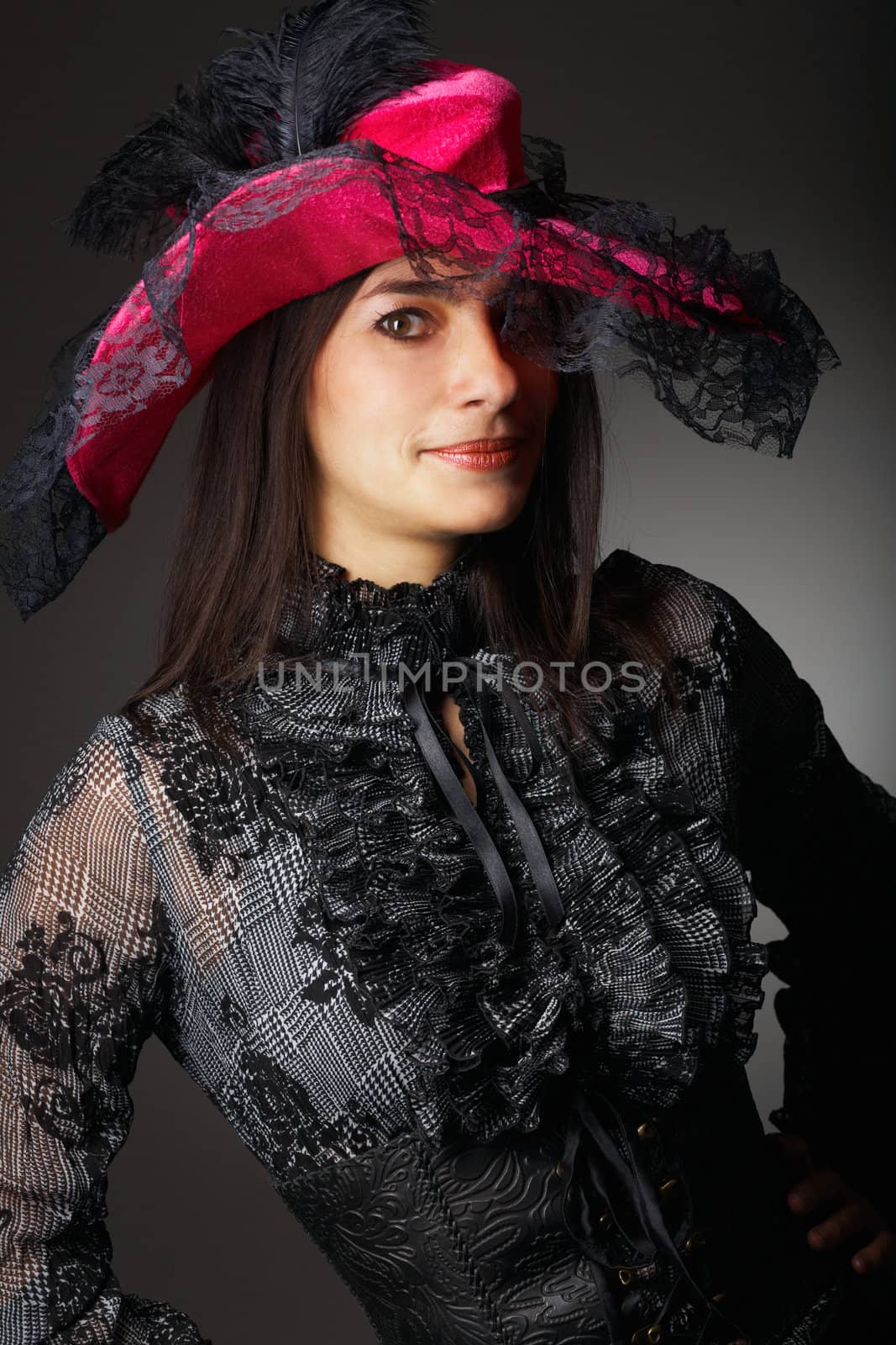 Beautiful woman in pink hat. Close-up view