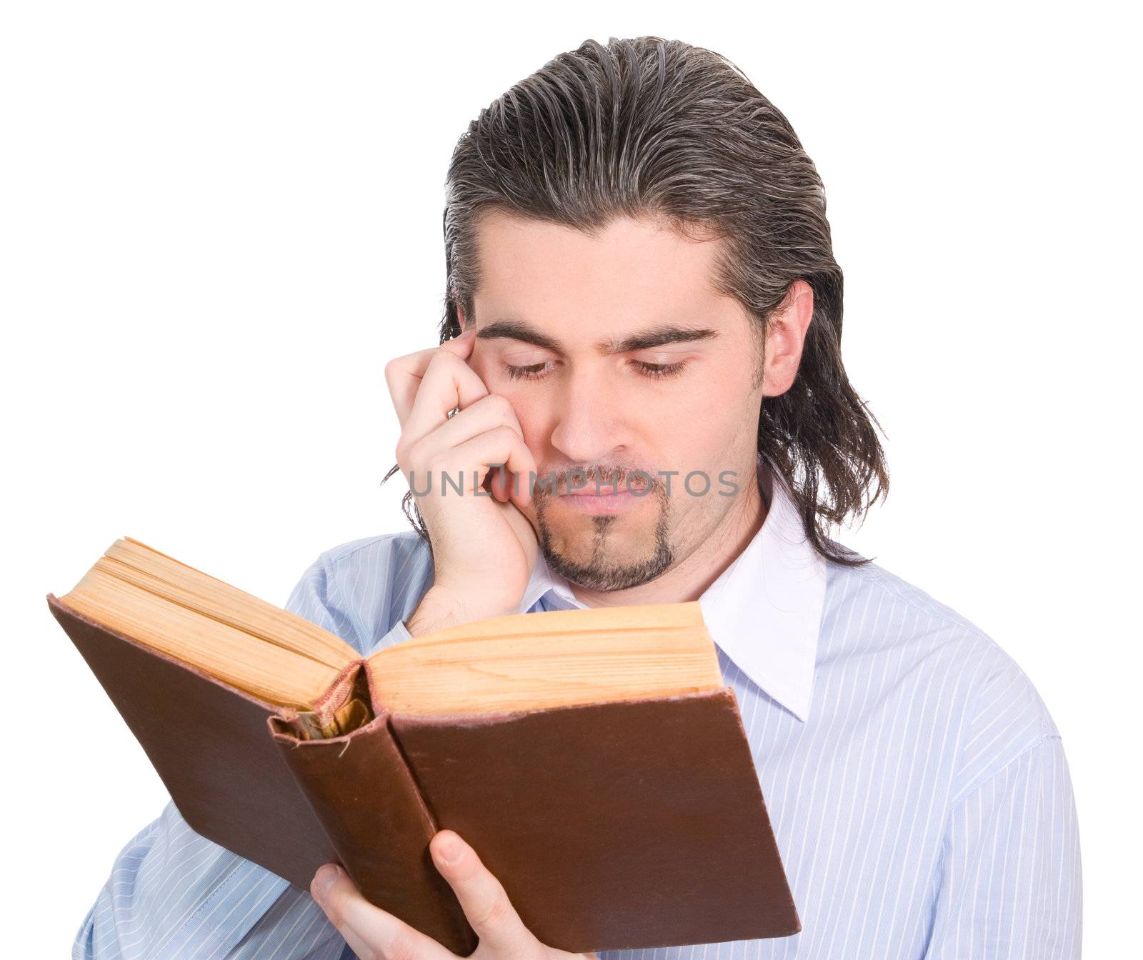 Young handsome guy looks into big book and thinks isolated white by Keetten_Predators