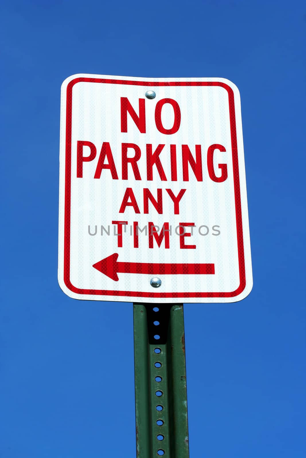 No Parking sign with blue sky