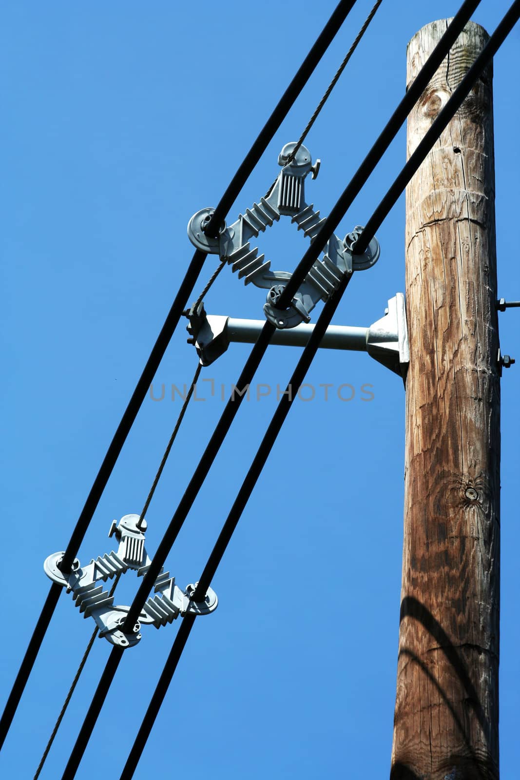 Telephone pole with wires by njnightsky