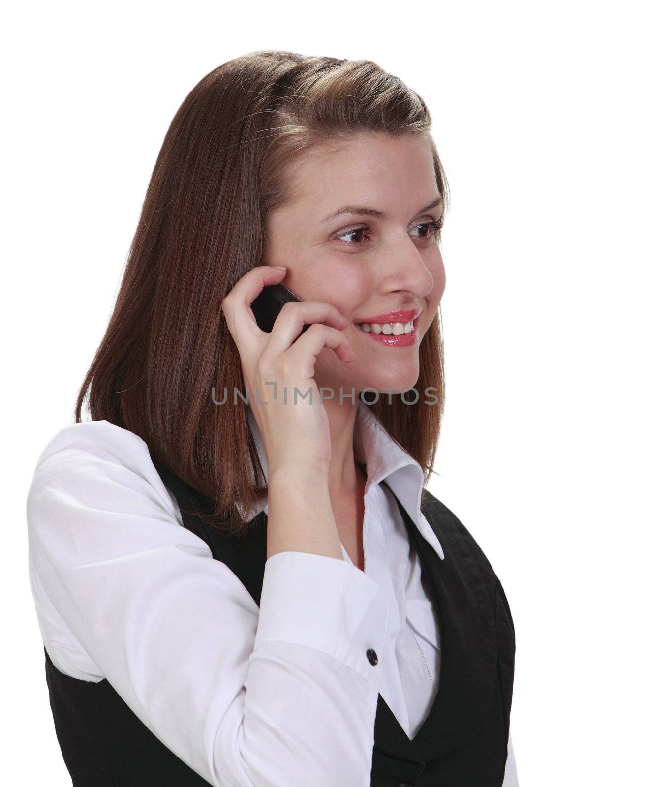 Portrait of a young woman on the phone, isolated against a white background.