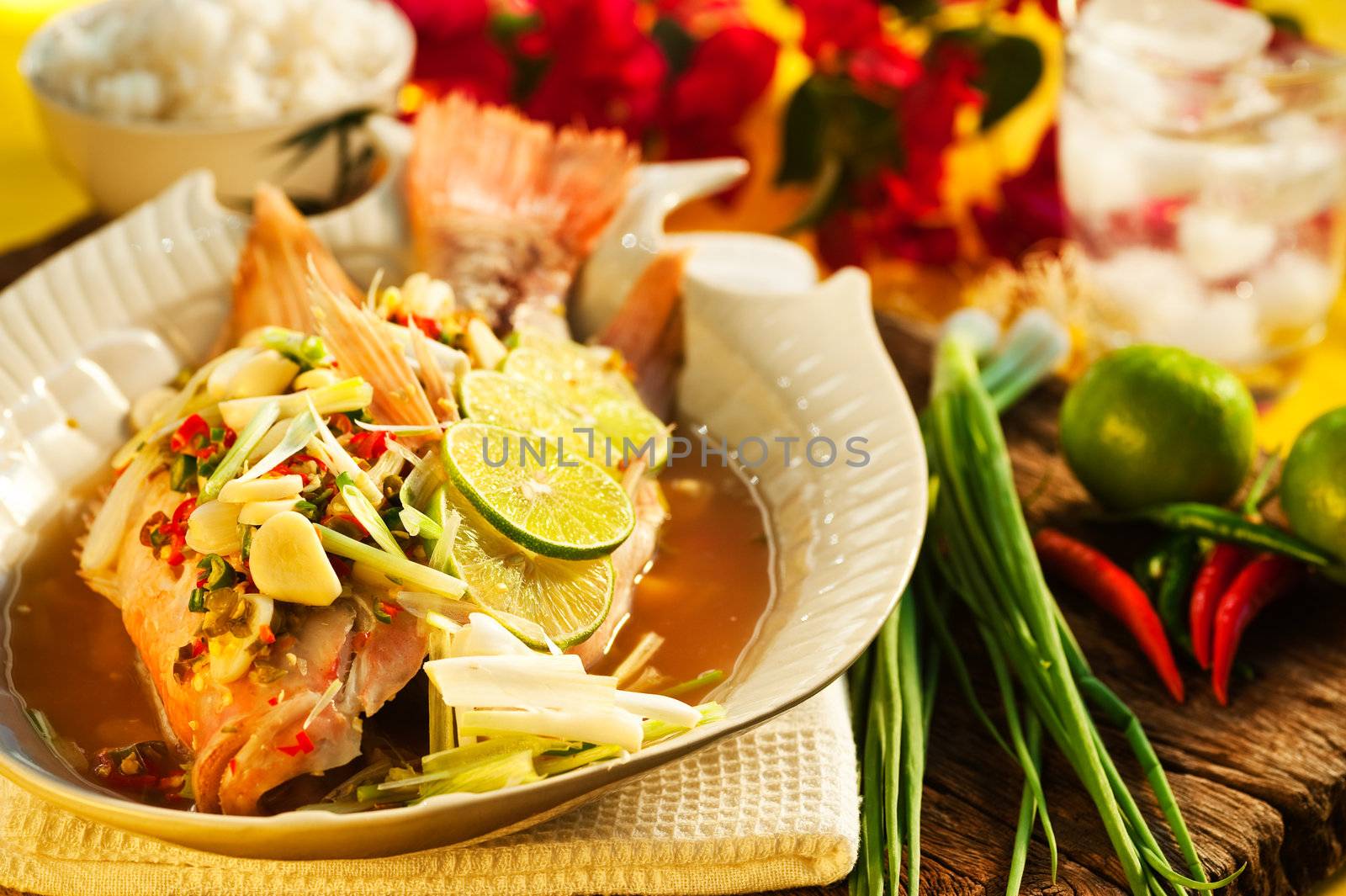 Thai food - Red snapper with garlic, chili, lemon grass and lemo by p.studio66