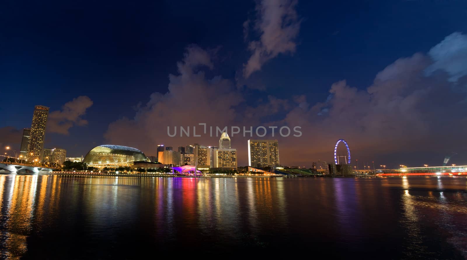 Evening view of Singapore's panorama with water reflection