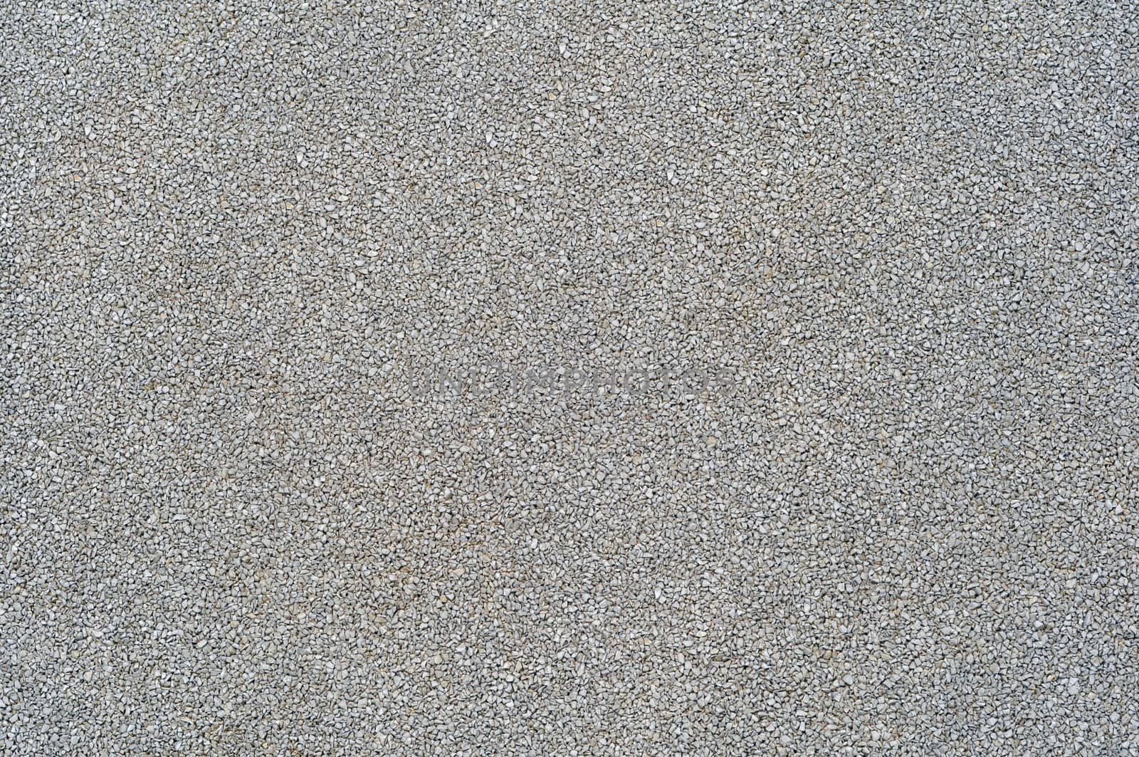 Decorative pavement surfacing made from a stone crumb