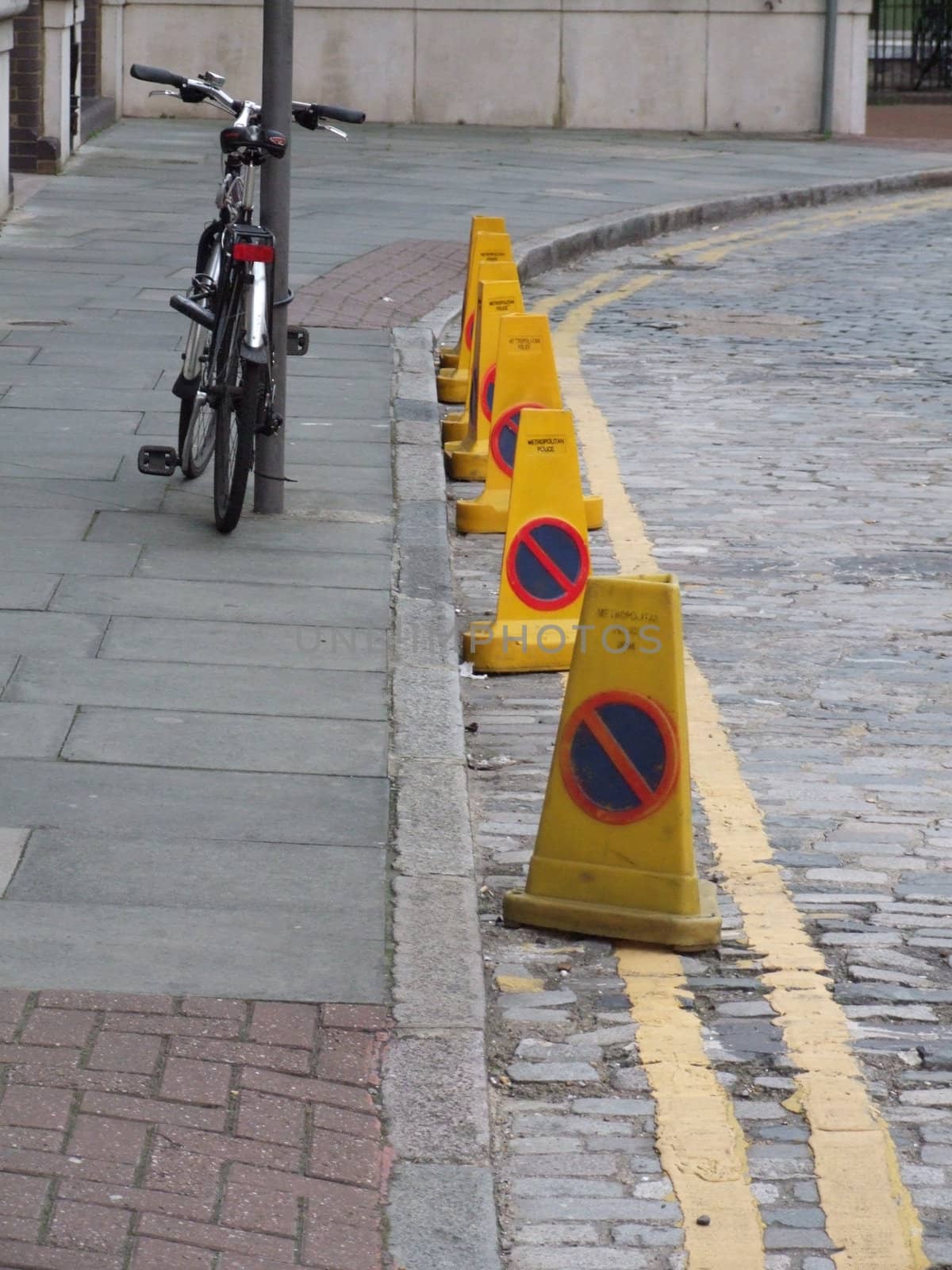Peddle Bike Yellow Street Cones Shot by steveabcuk
