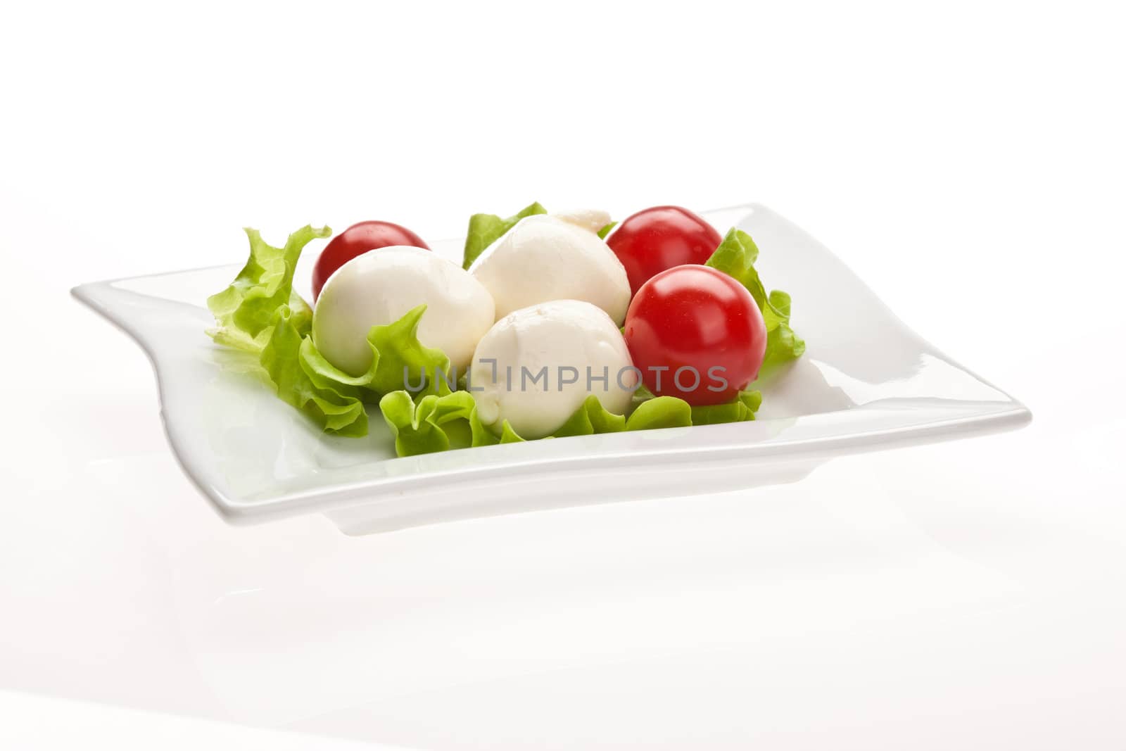 food series: mozzarella, tomato and lettuce over white