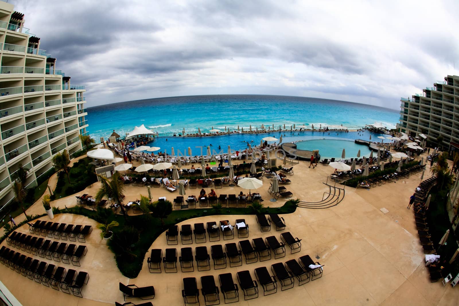 The beach front at a luxury beach resort in Cancun by gary718