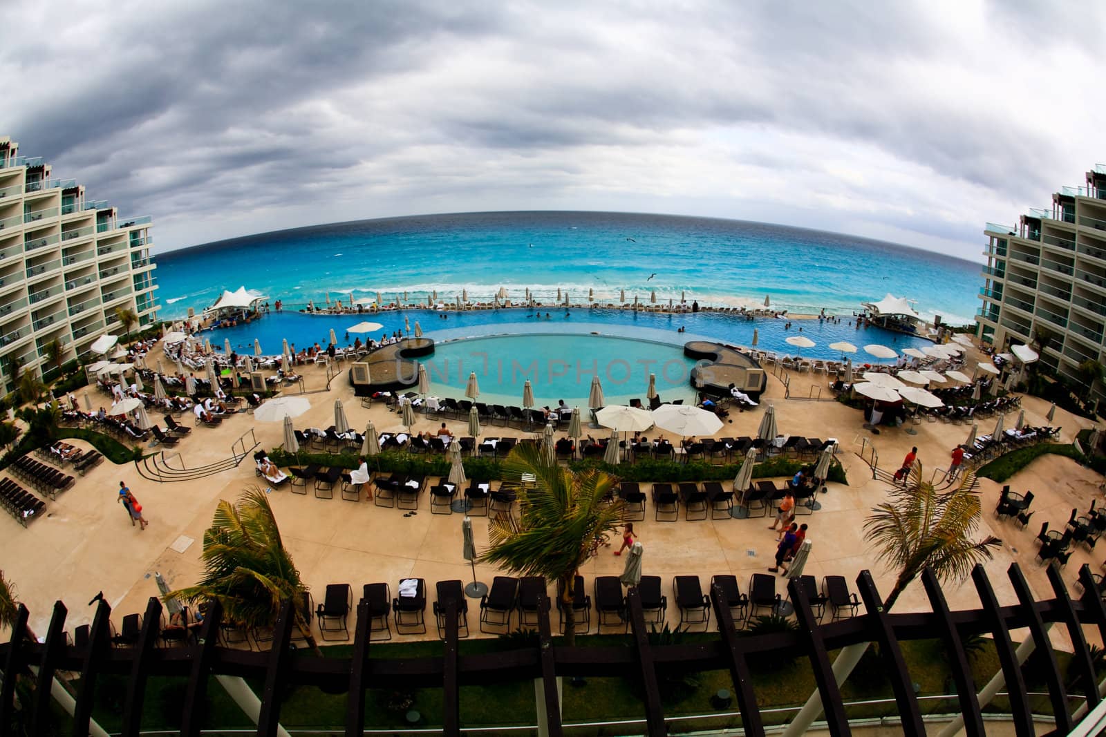 The beach front at a luxury beach resort in Cancun Mexico, a fisheye view