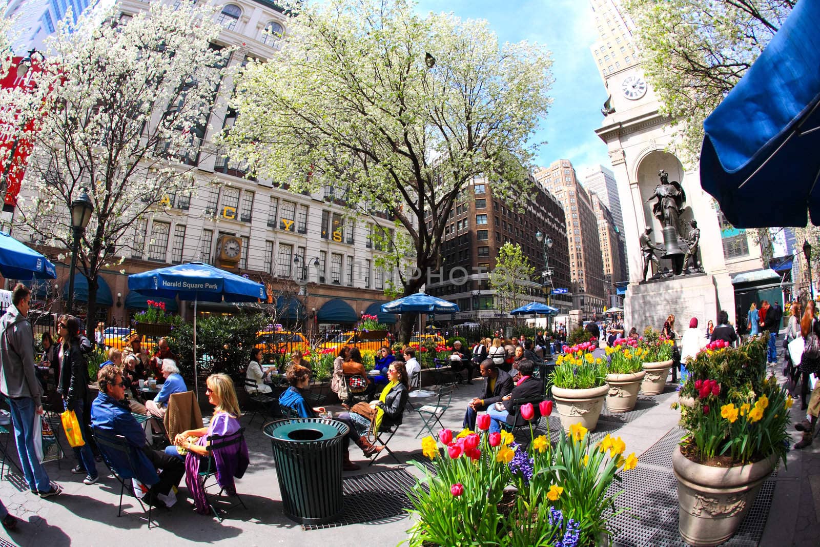 New York City, April 17,2009: The people enjoy sunny spring days at the Herald Square in midtown Manhattan.