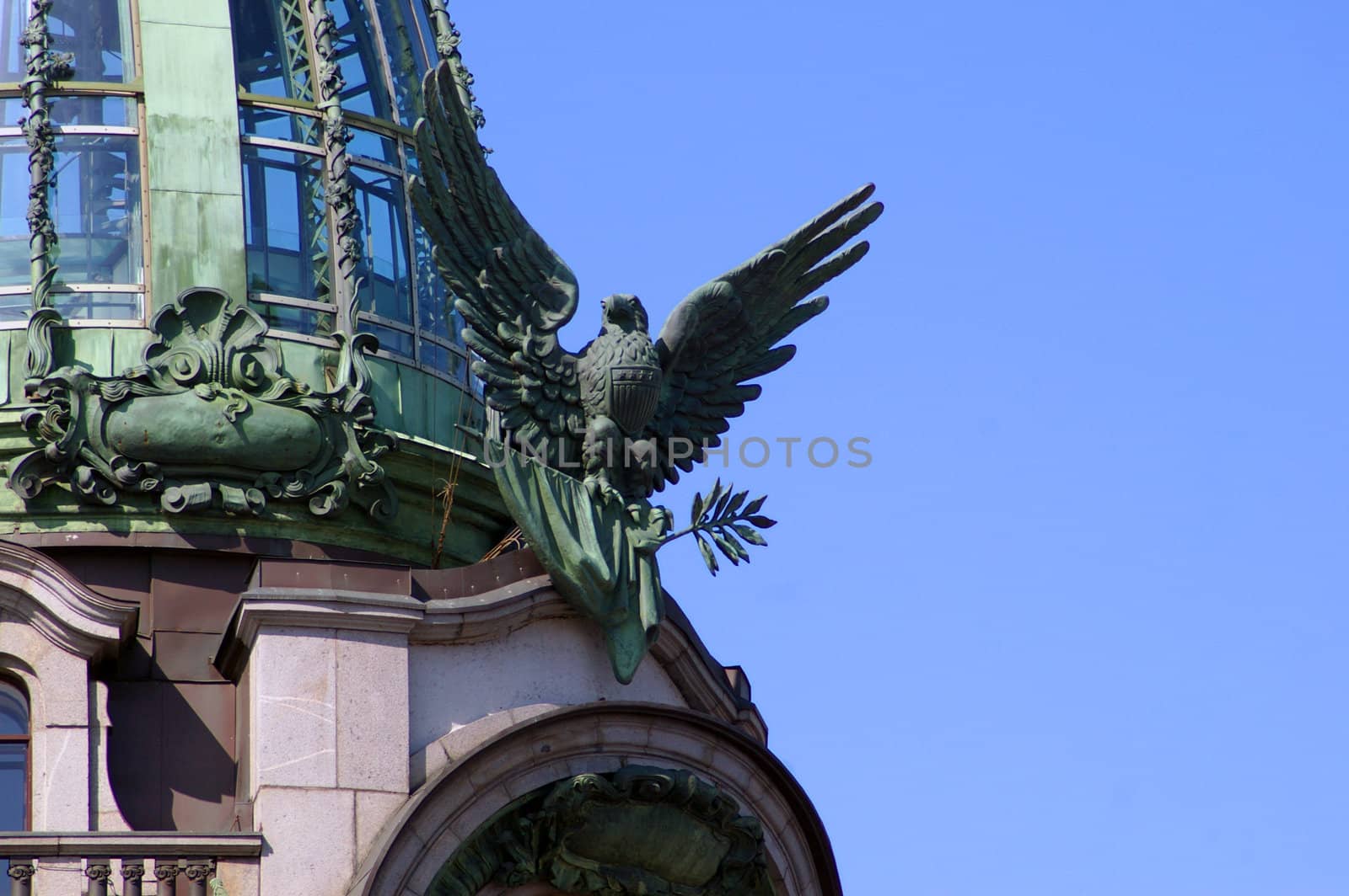 Statue of a american bald eagle on building in Saint-Petersburg, Russia.