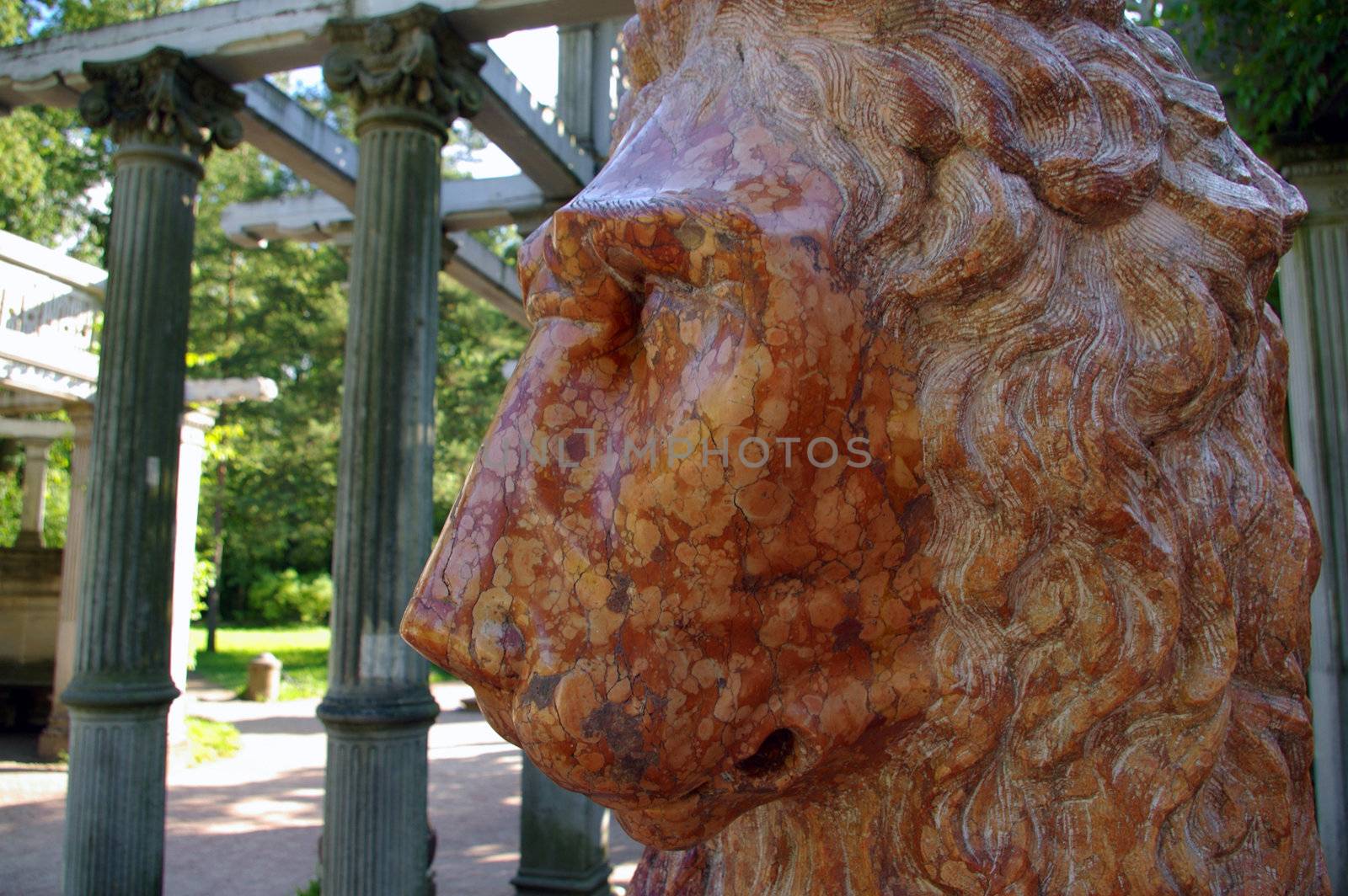 old lion statue in the imperial garden. Tzarskoye Selo, Russia.
