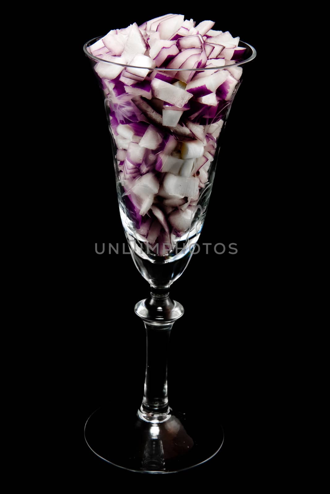 Picture of chopped red onions in a wine glass