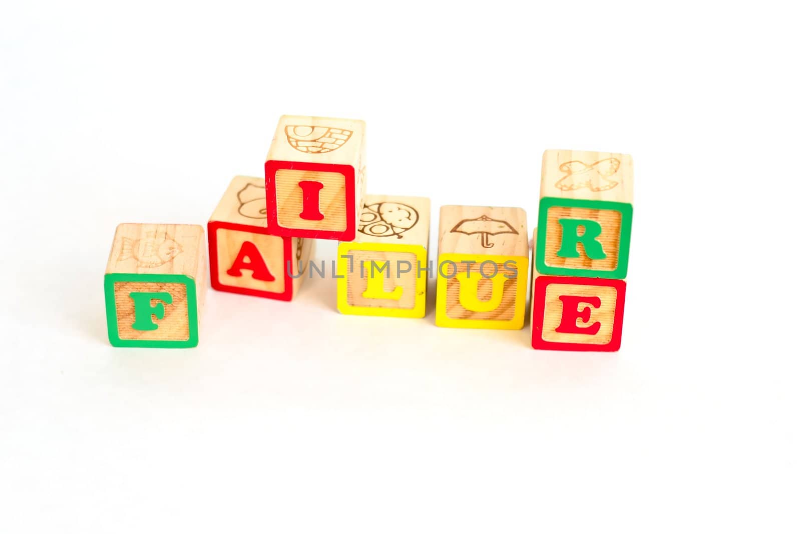 Vintage alphabet blocks spelling out Failure