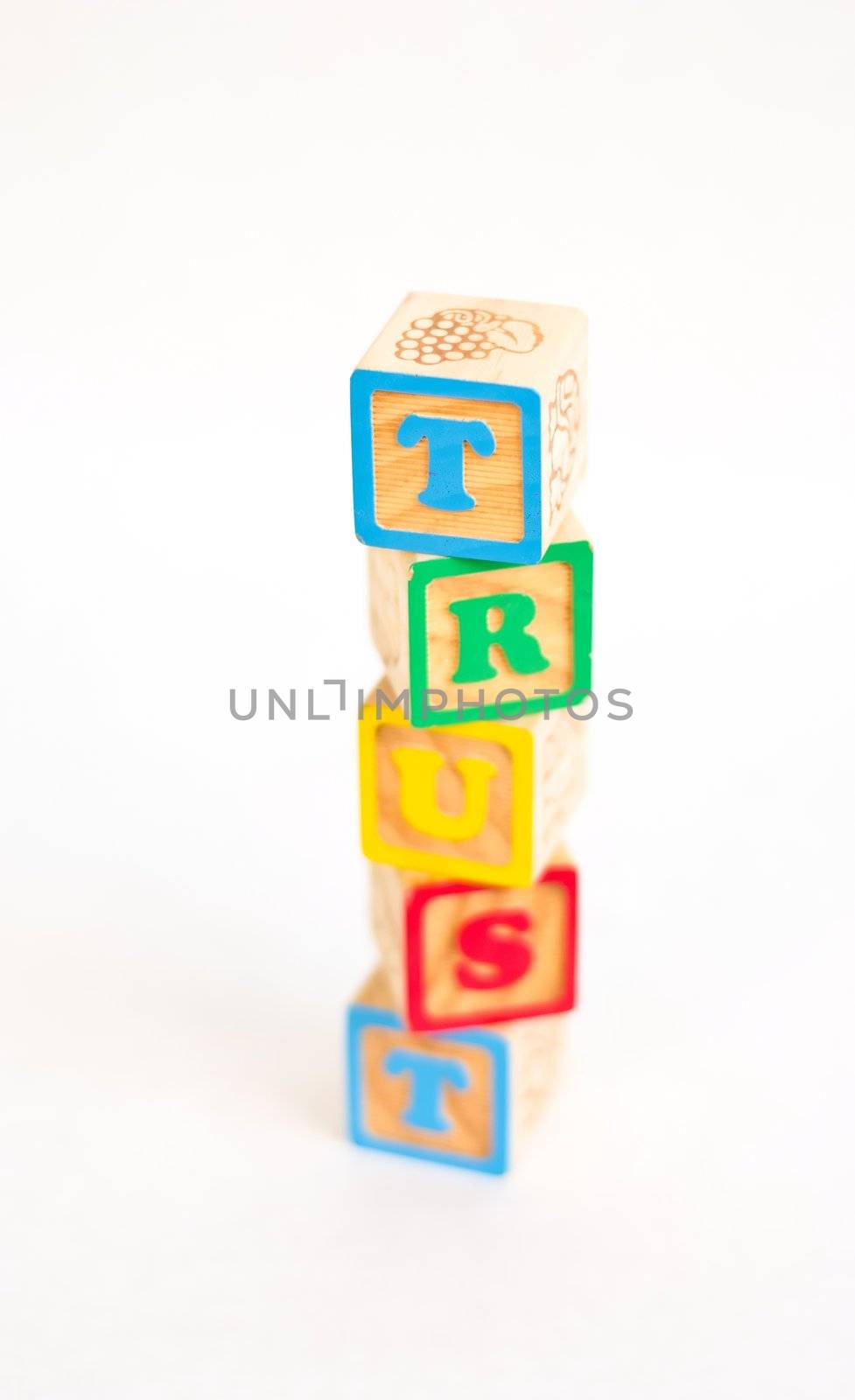 Vintage alphabet blocks spelling out TRUST