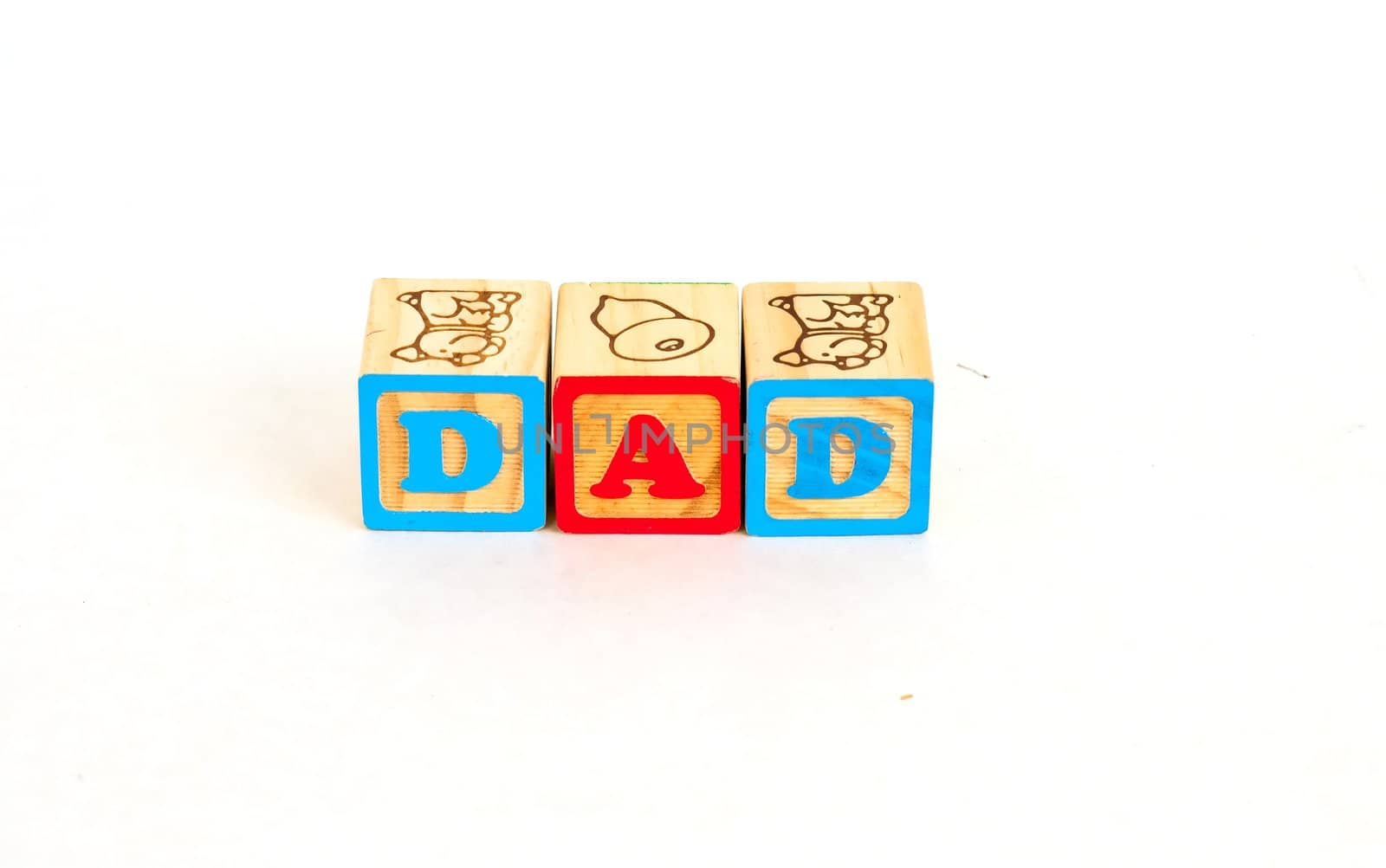 Vintage alphabet blocks spelling out DAD