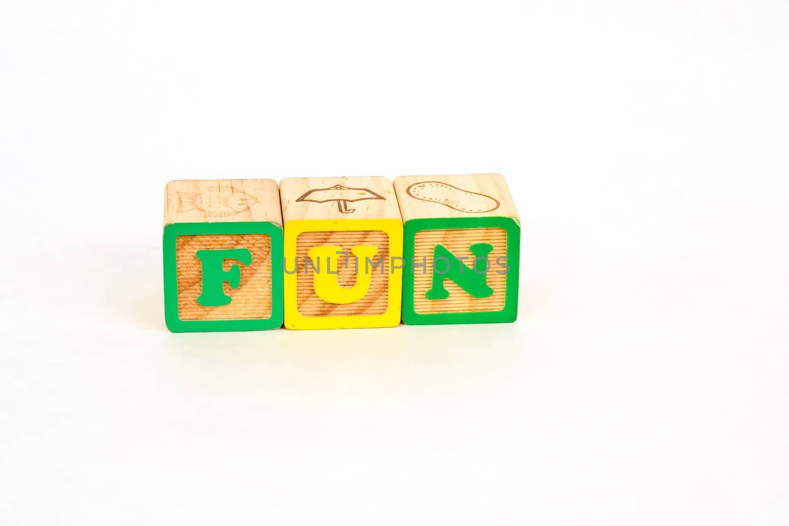 Vintage alphabet blocks spelling out FUN