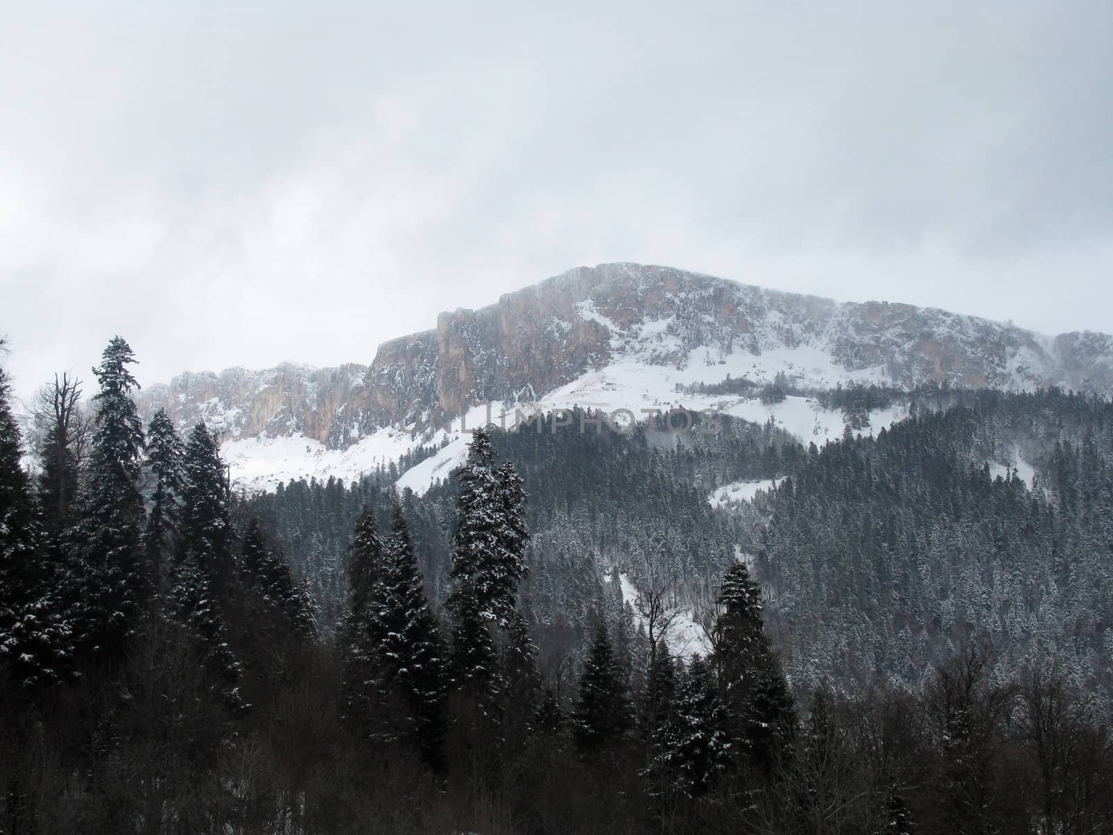 The main Caucasian ridge; rocks; a relief; a landscape; a hill; a panorama; high mountains; peaks; caucasus; top; a slope