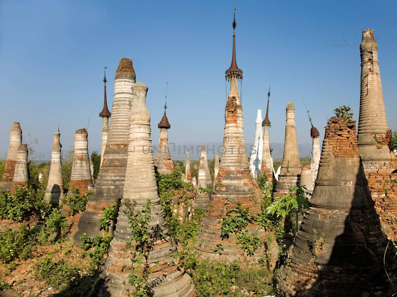  Shwe Inn Thein Paya, Indein, (Nyaungshwe),  Inle Lake,Shan state, myanmar (Burma). Weather-beaten buddhistic zedi constructed in 17th and 18th century damaged by earthquake in 1975, partitialy back reconstructed.