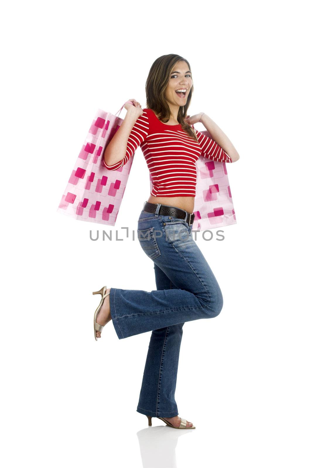 Young beautiful attractive woman isolated on white holding shopping bags