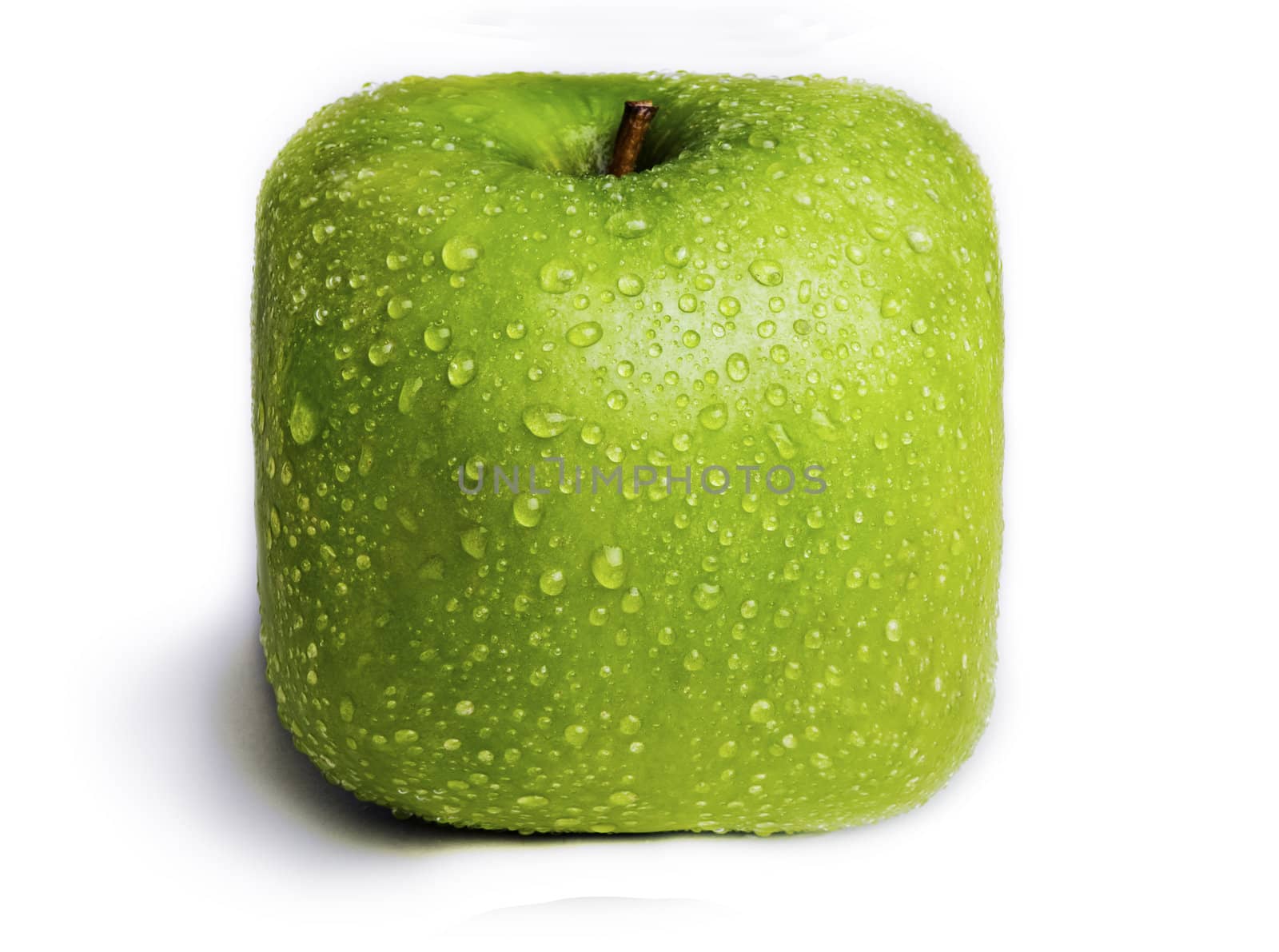 A single green apple in the shape of a square isolated on white with water droplets on it.