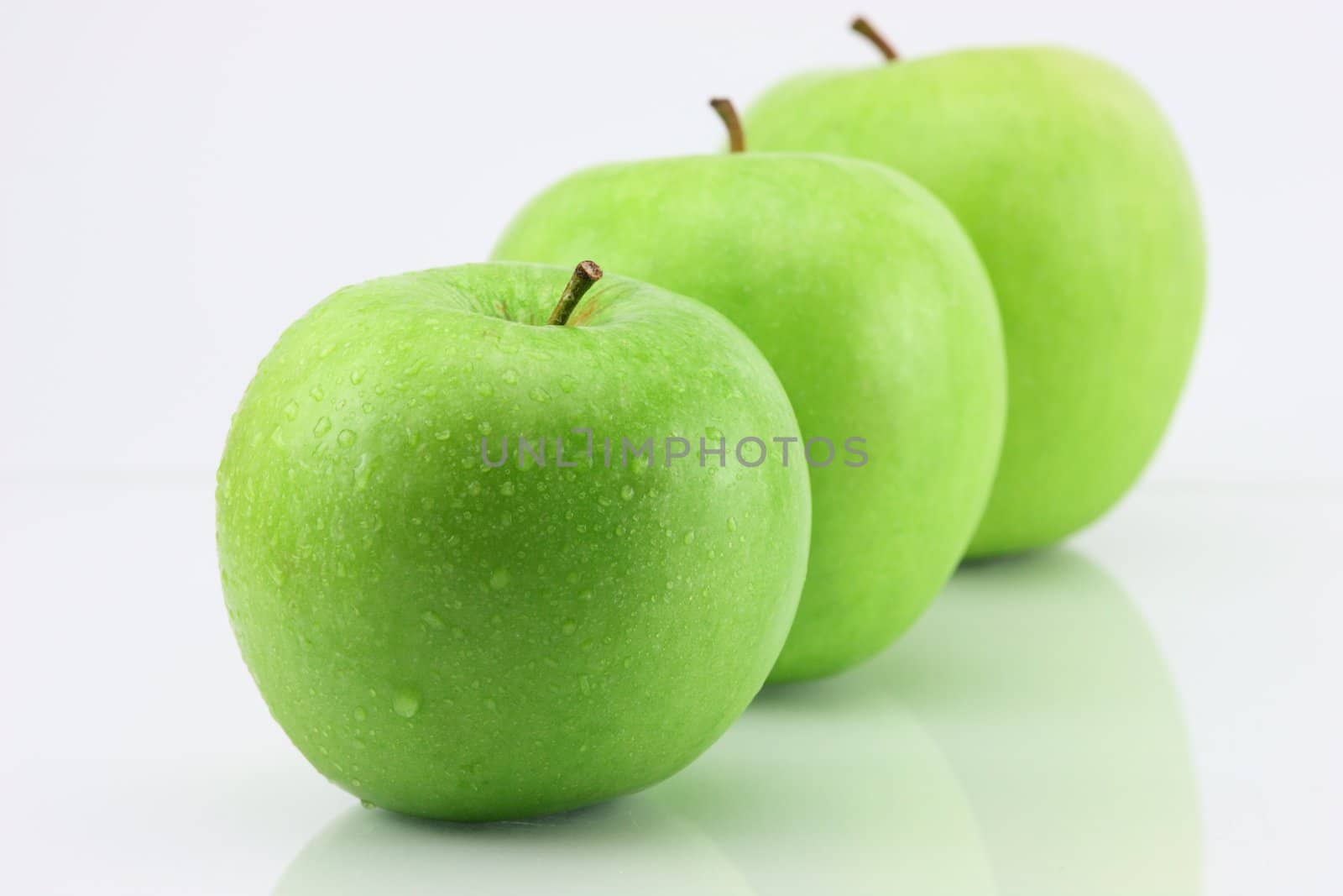 three apple isolated on white