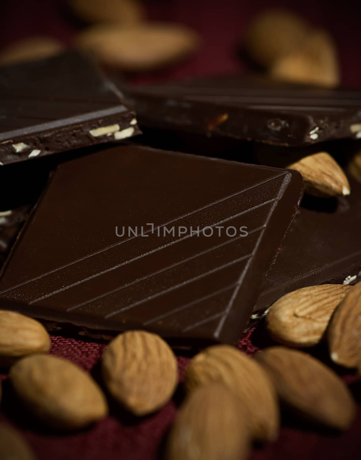 Pieces of milk chocolate with almonds.