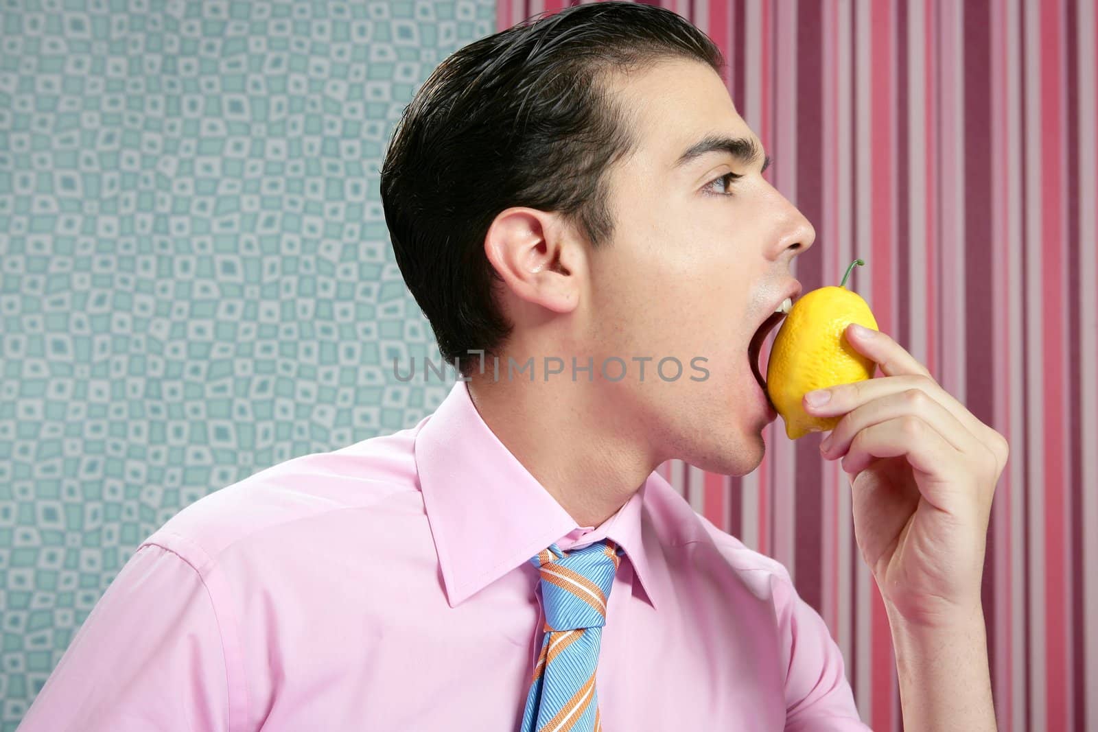 Funny businessman with lemon fruit on hand by lunamarina
