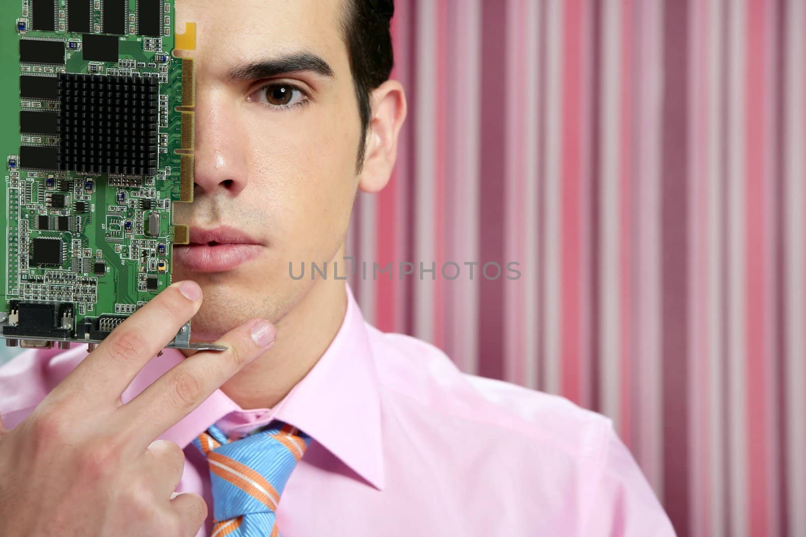 Businessman with electronic circuit in face as technology metaphor