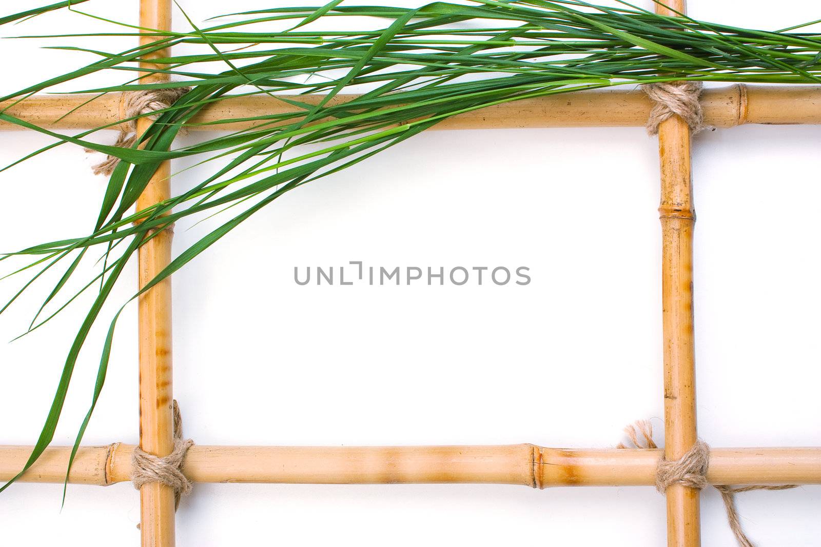 Frame for pictures from bamboo and leaves